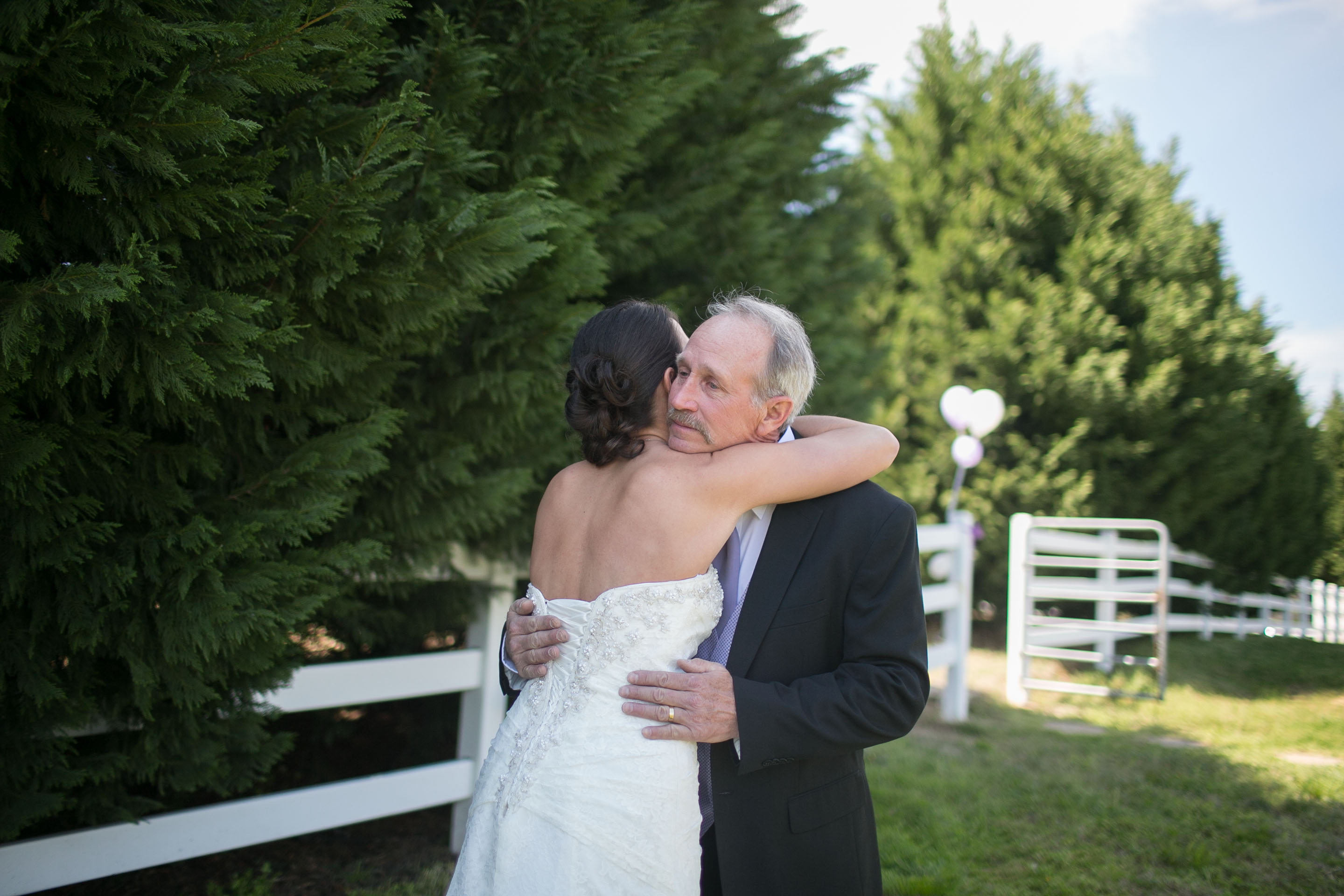 father-hugging-bride