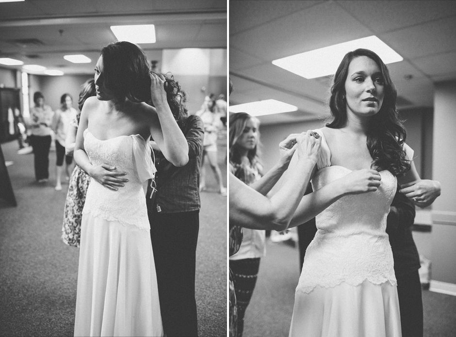 bride-putting-on-dress