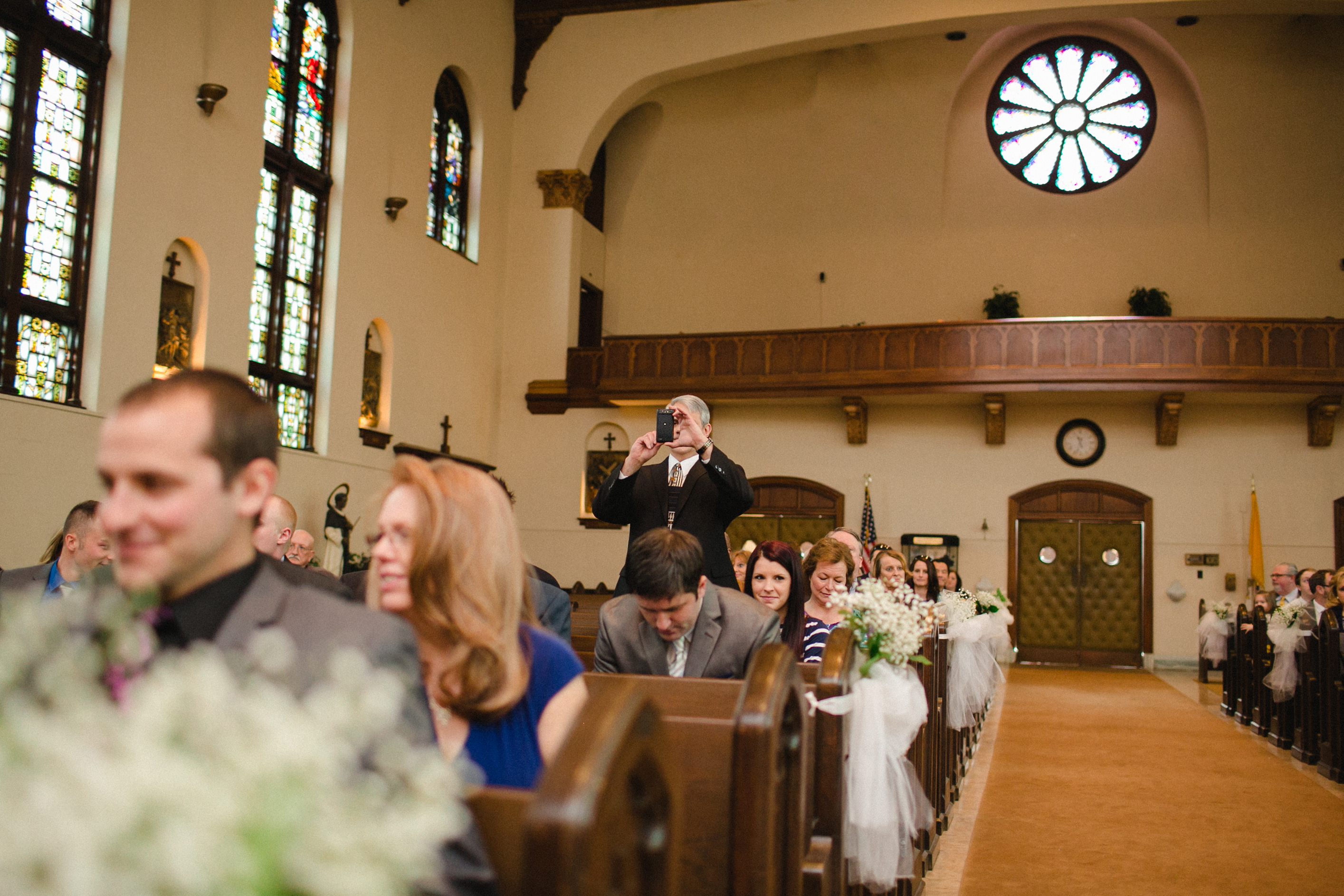 wedding guest with iPhone