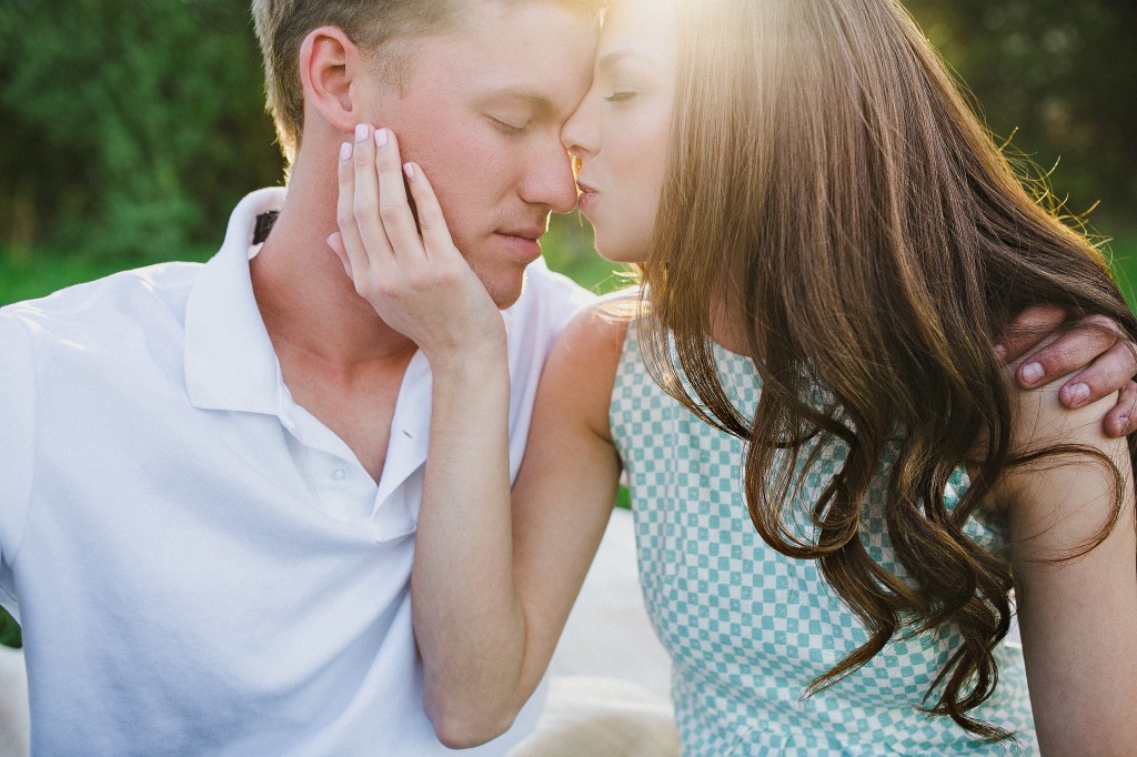 romantic casual engagement photos in a field