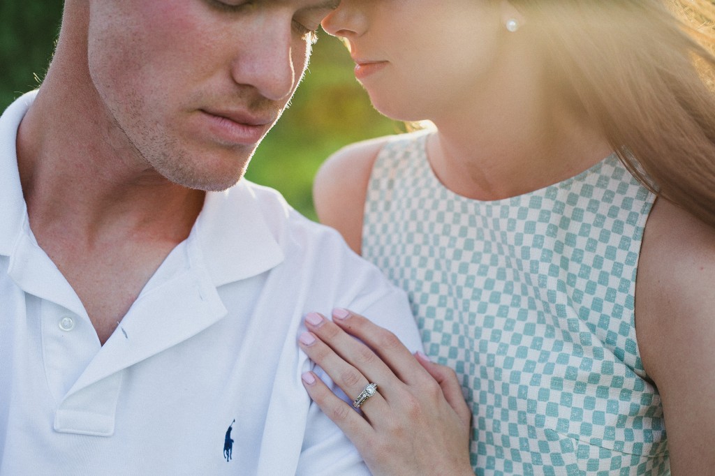 romantic casual engagement photos in a field