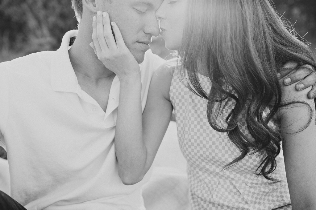 romantic casual engagement photos in a field
