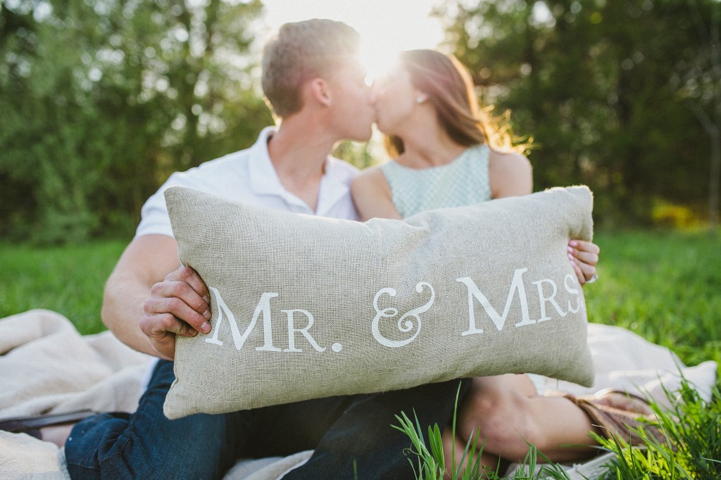 romantic casual engagement photos in a field