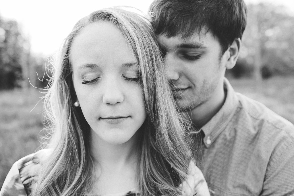 engagement photos in a field, rural engagement photos, rust engagement photos, Tennessee wedding photography, Kelly Ginn Photography,  romantic engagement photos, creative engagement photos, intimate engagement photos, candid engagement photos