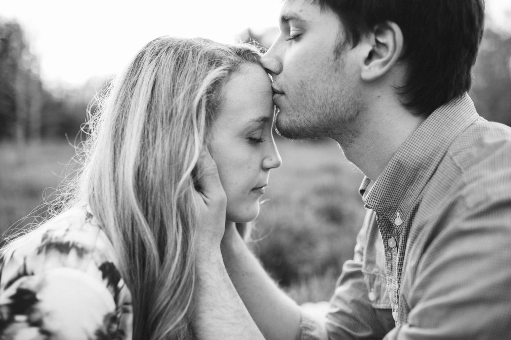 engagement photos in a field, rural engagement photos, rust engagement photos, Tennessee wedding photography, Kelly Ginn Photography,  romantic engagement photos, creative engagement photos, intimate engagement photos, candid engagement photos
