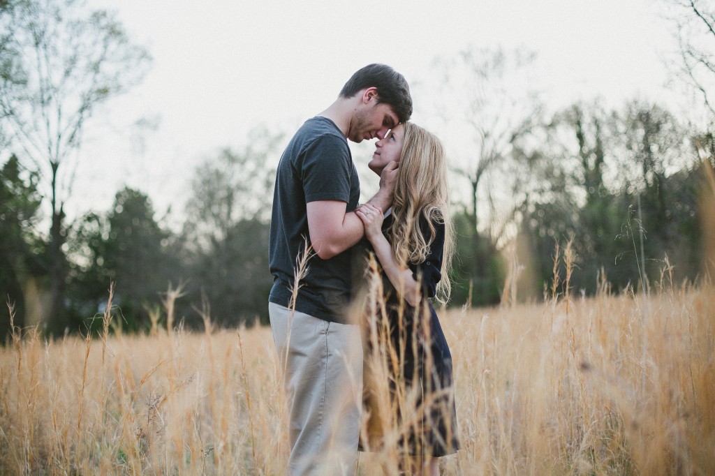 engagement photos in a field, rural engagement photos, rust engagement photos, Tennessee wedding photography, Kelly Ginn Photography,  romantic engagement photos, creative engagement photos, intimate engagement photos, candid engagement photos