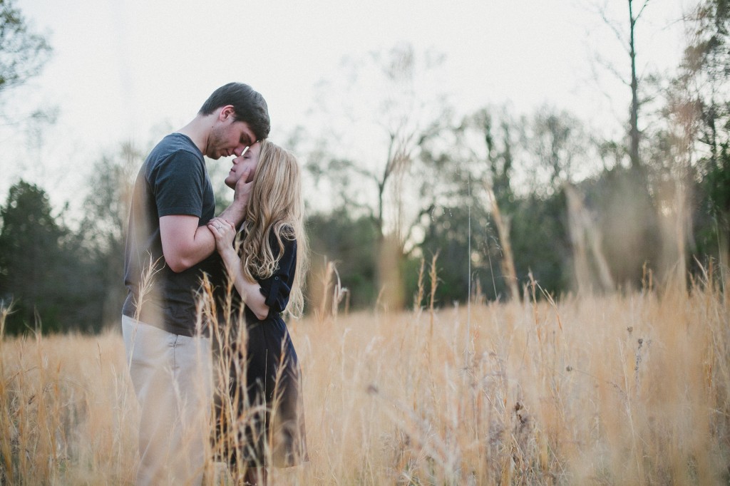 engagement photos in a field, rural engagement photos, rust engagement photos, Tennessee wedding photography, Kelly Ginn Photography,  romantic engagement photos, creative engagement photos, intimate engagement photos, candid engagement photos