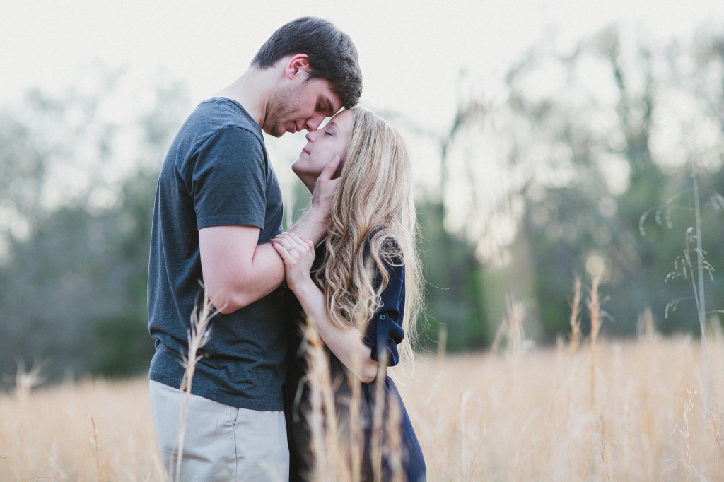 engagement photos in a field, rural engagement photos, rust engagement photos, Tennessee wedding photography, Kelly Ginn Photography,  romantic engagement photos, creative engagement photos, intimate engagement photos, candid engagement photos