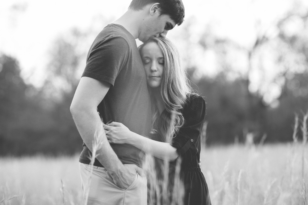 engagement photos in a field, rural engagement photos, rust engagement photos, Tennessee wedding photography, Kelly Ginn Photography,  romantic engagement photos, creative engagement photos, intimate engagement photos, candid engagement photos