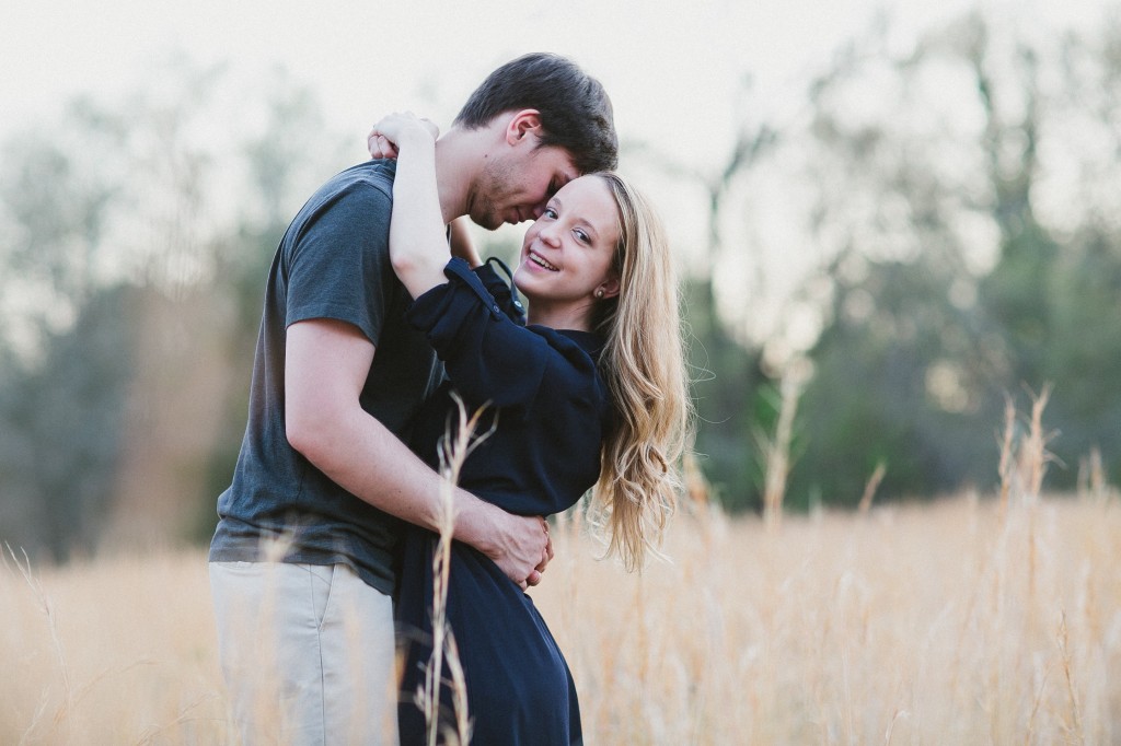 engagement photos in a field, rural engagement photos, rust engagement photos, Tennessee wedding photography, Kelly Ginn Photography,  romantic engagement photos, creative engagement photos, intimate engagement photos, candid engagement photos