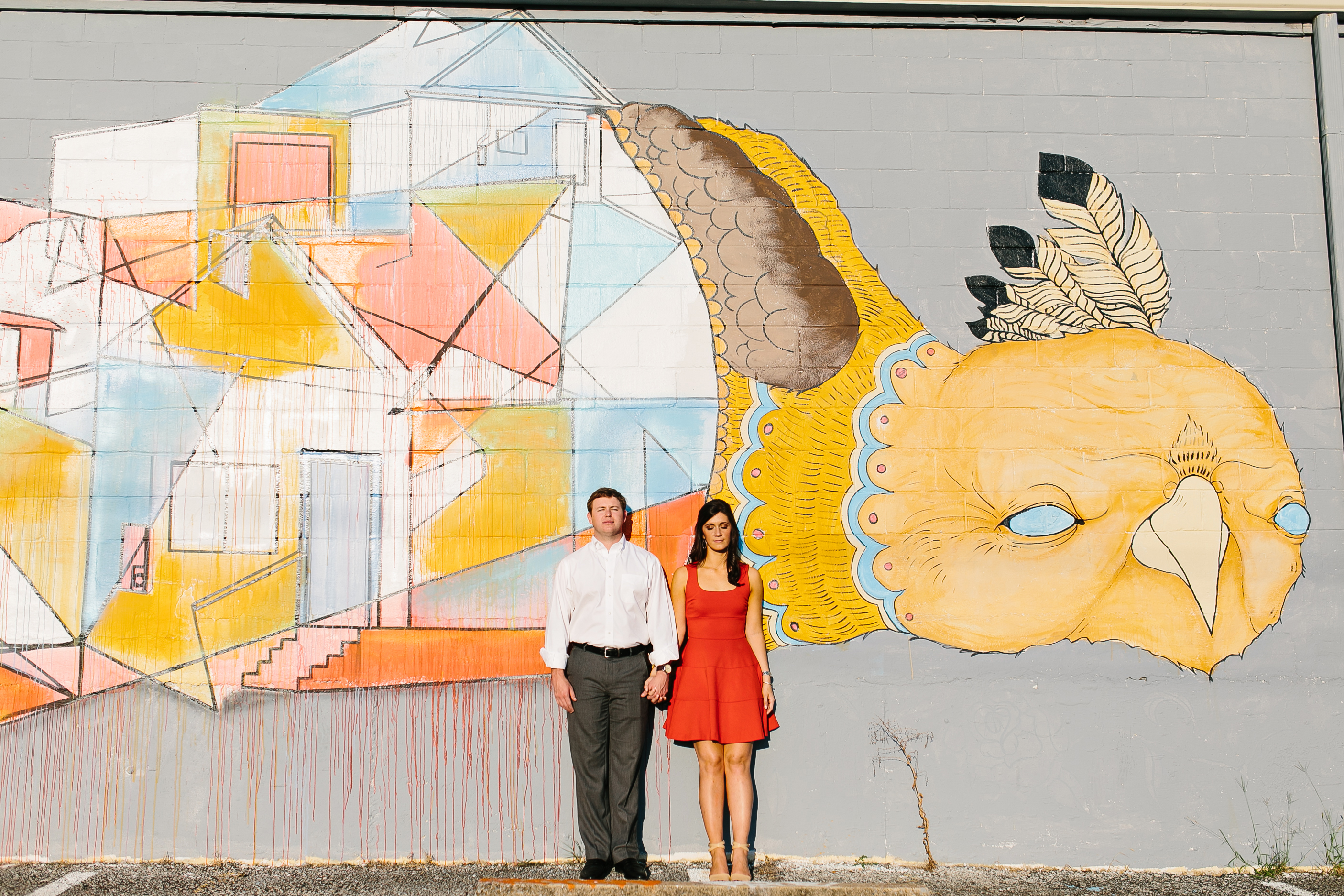 intimate creative engagement photos, lifestyle photographer, candid engagement photos, engagement photos, memphis mural