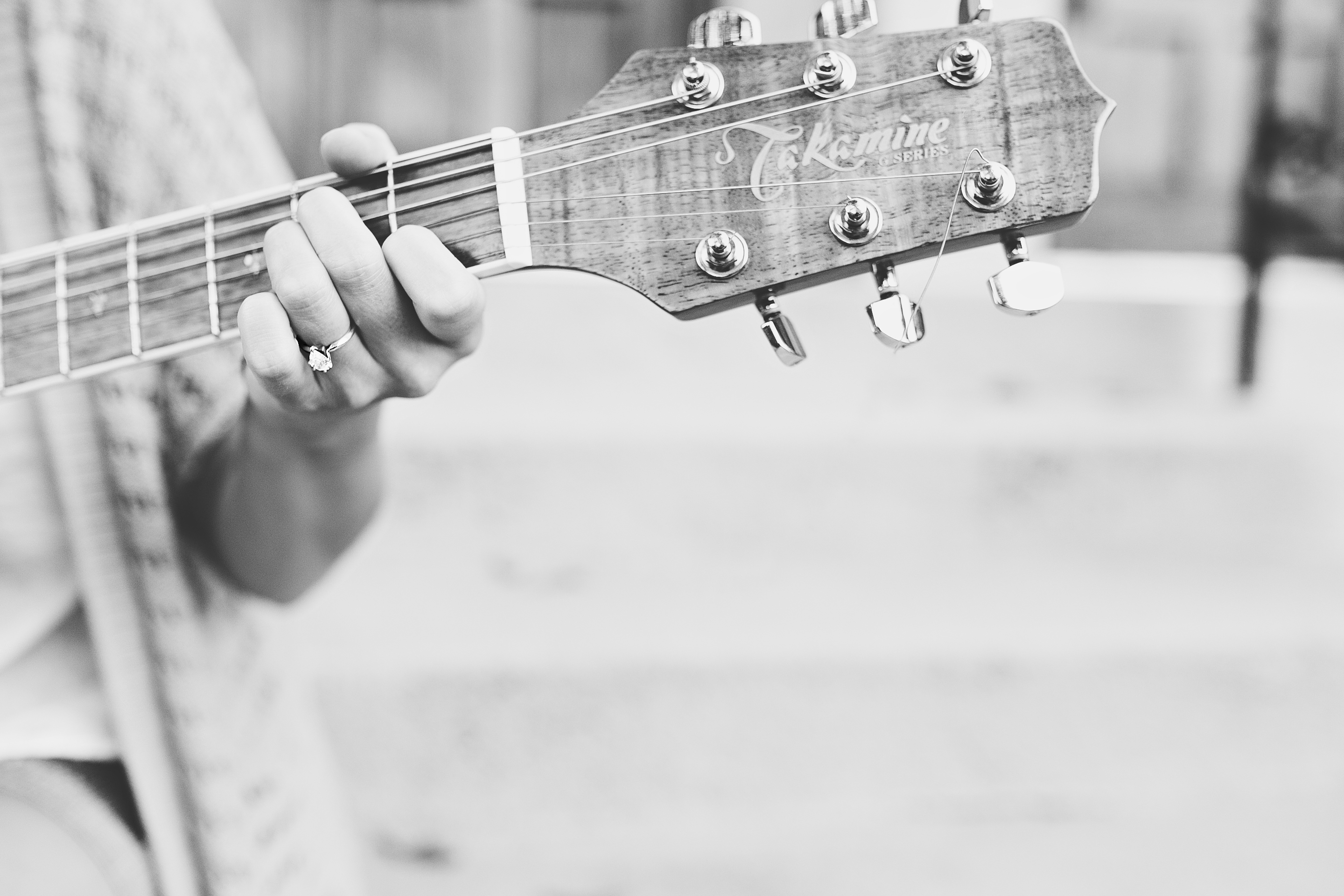 musical engagement session, guitar with engagement ring