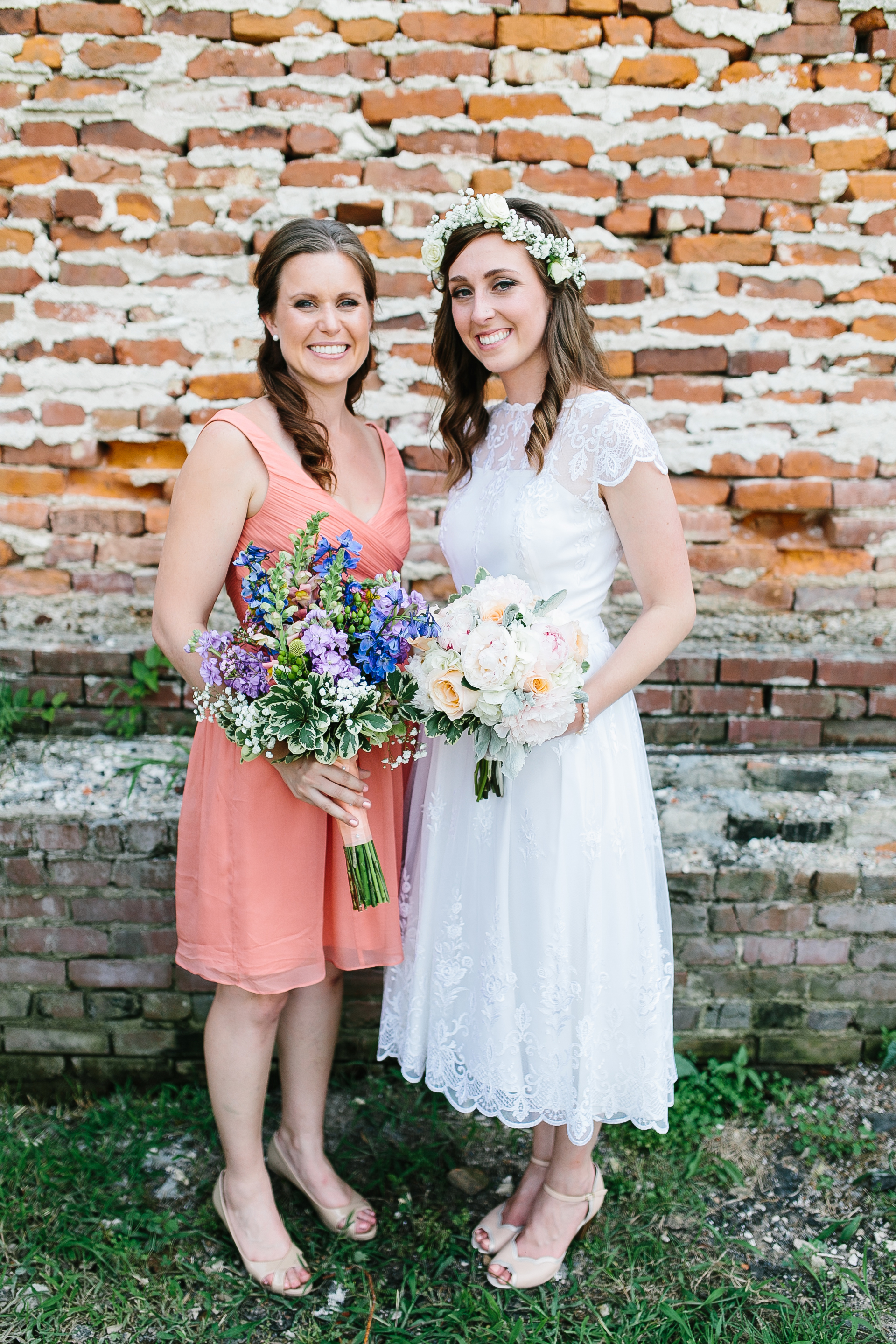 peach bridesmaids dresses. vibrant bouquets. flower crown