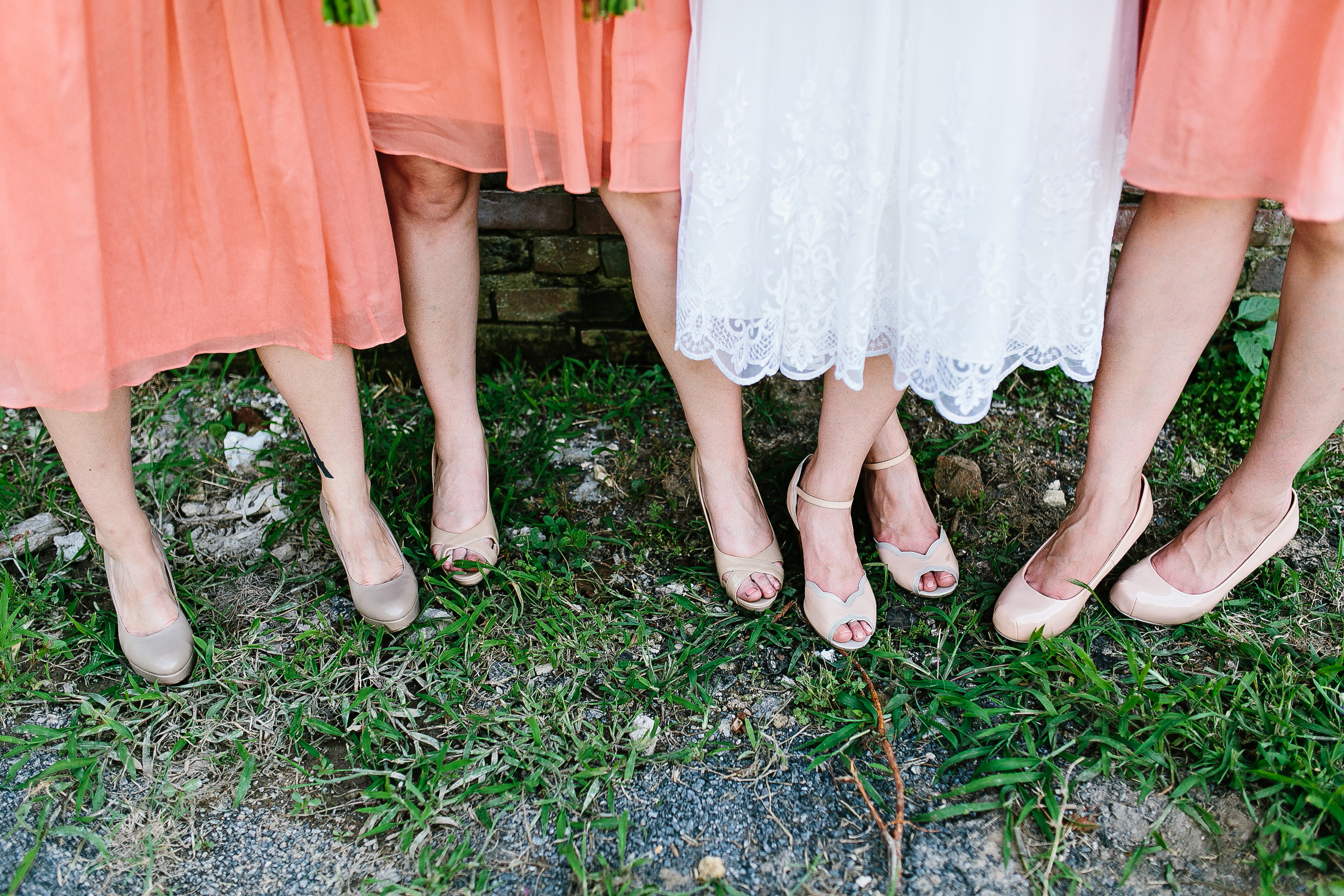 peach bridesmaids dresses. vibrant bouquets. flower crown