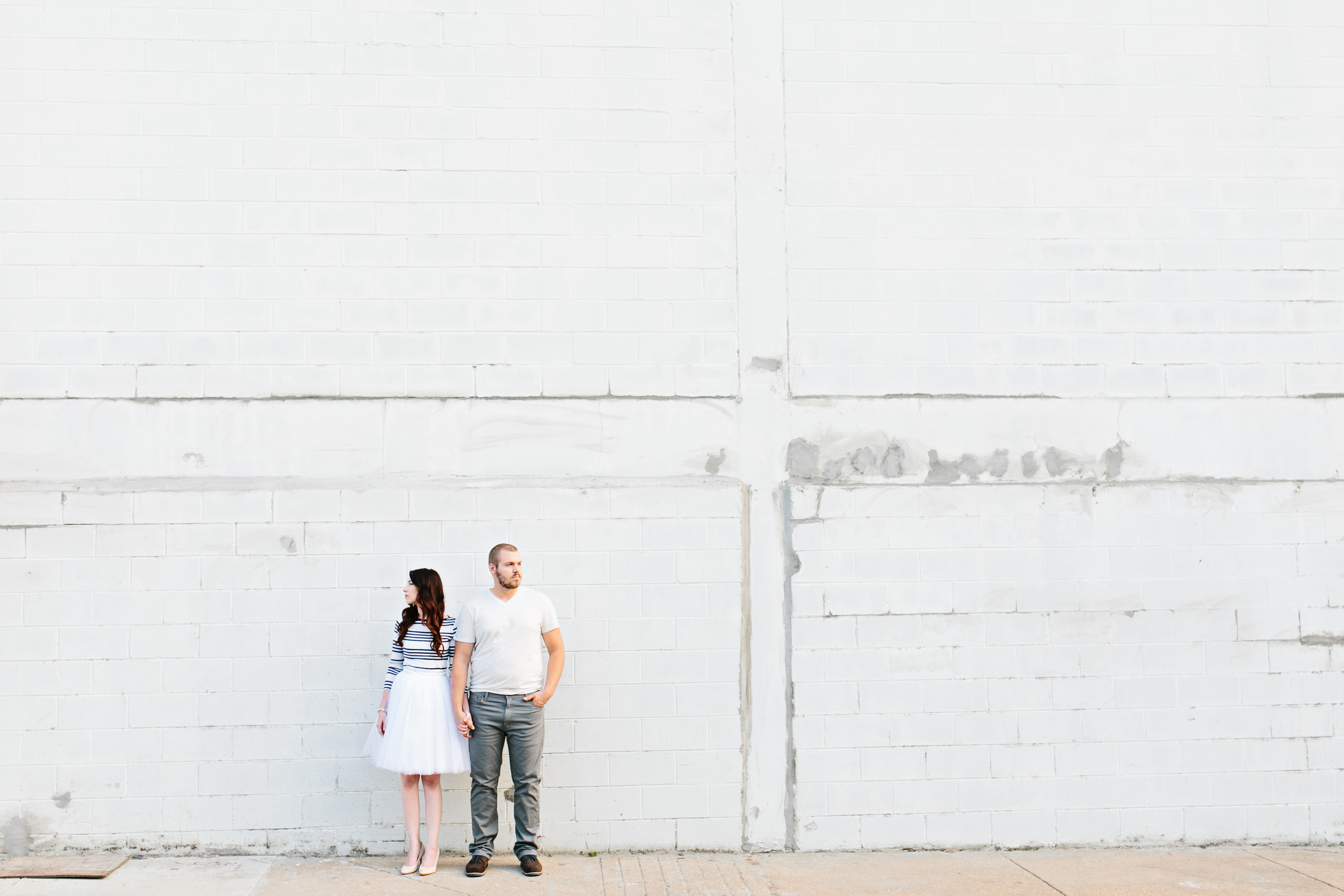 creative engagement photos. Urban engagement session, midtown engagement session. Journalistic wedding photographer. Tulle skirt