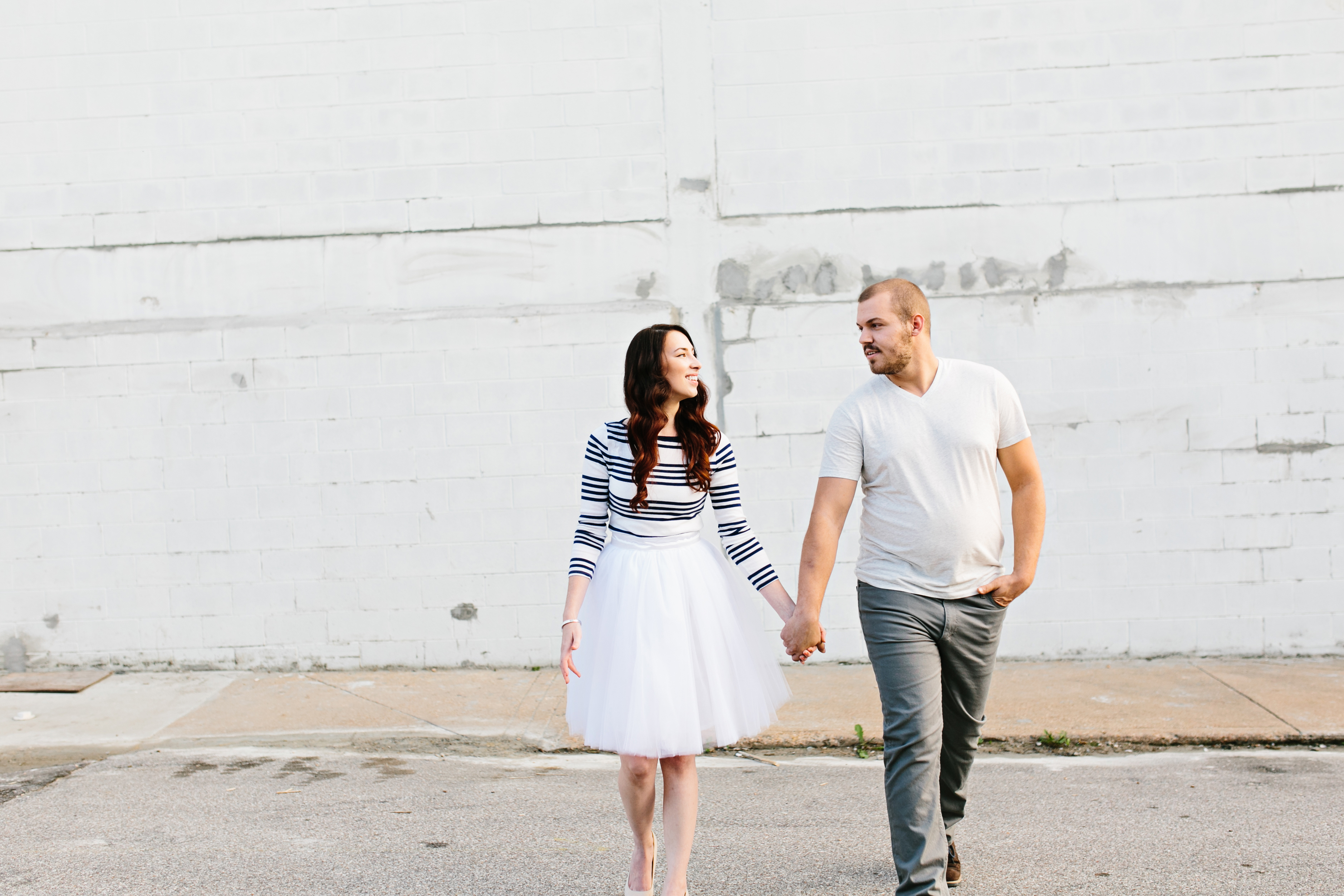 creative engagement photos. Urban engagement session, midtown engagement session. Journalistic wedding photographer. Tulle skirt