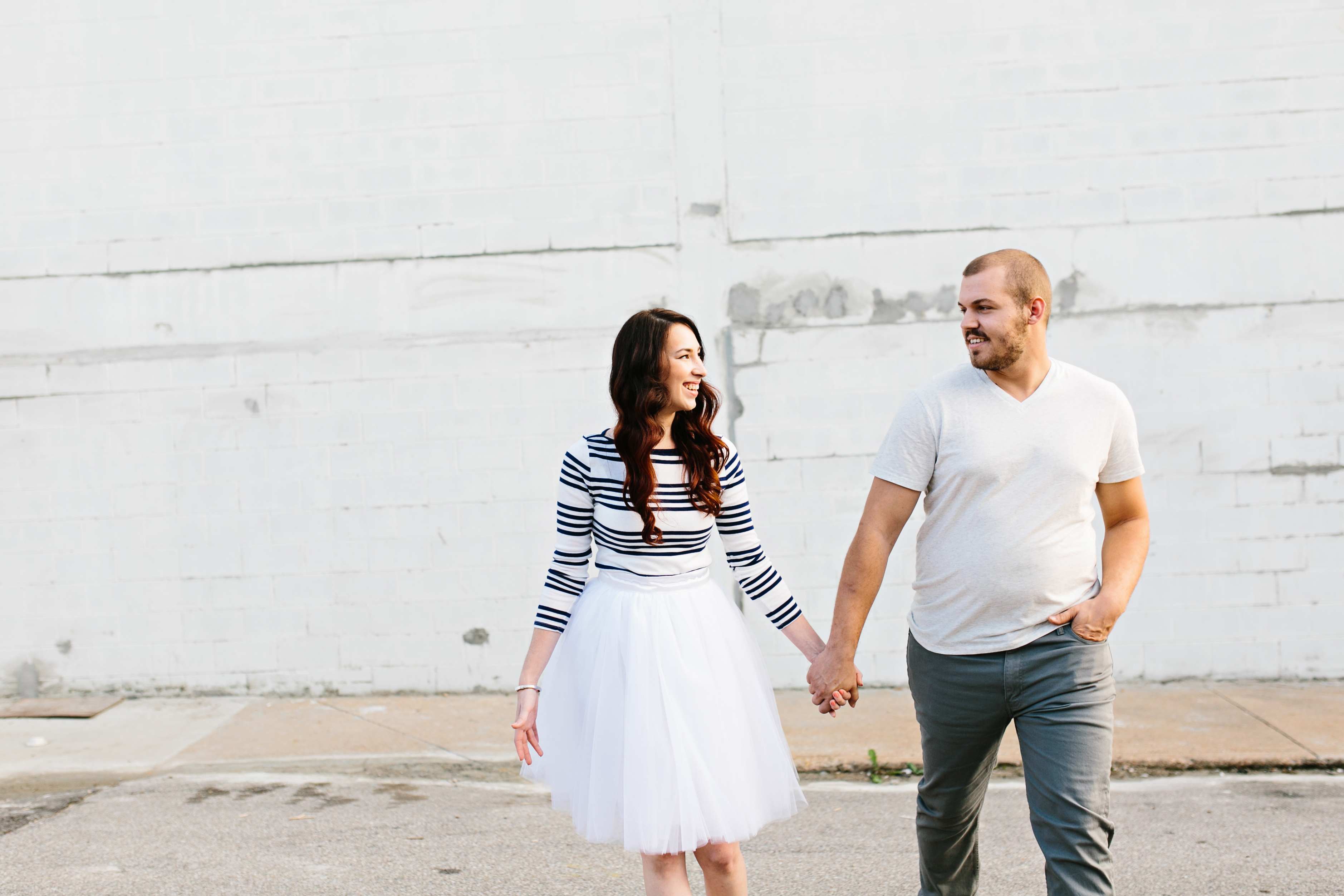 creative engagement photos. Urban engagement session, midtown engagement session. Journalistic wedding photographer. Tulle skirt