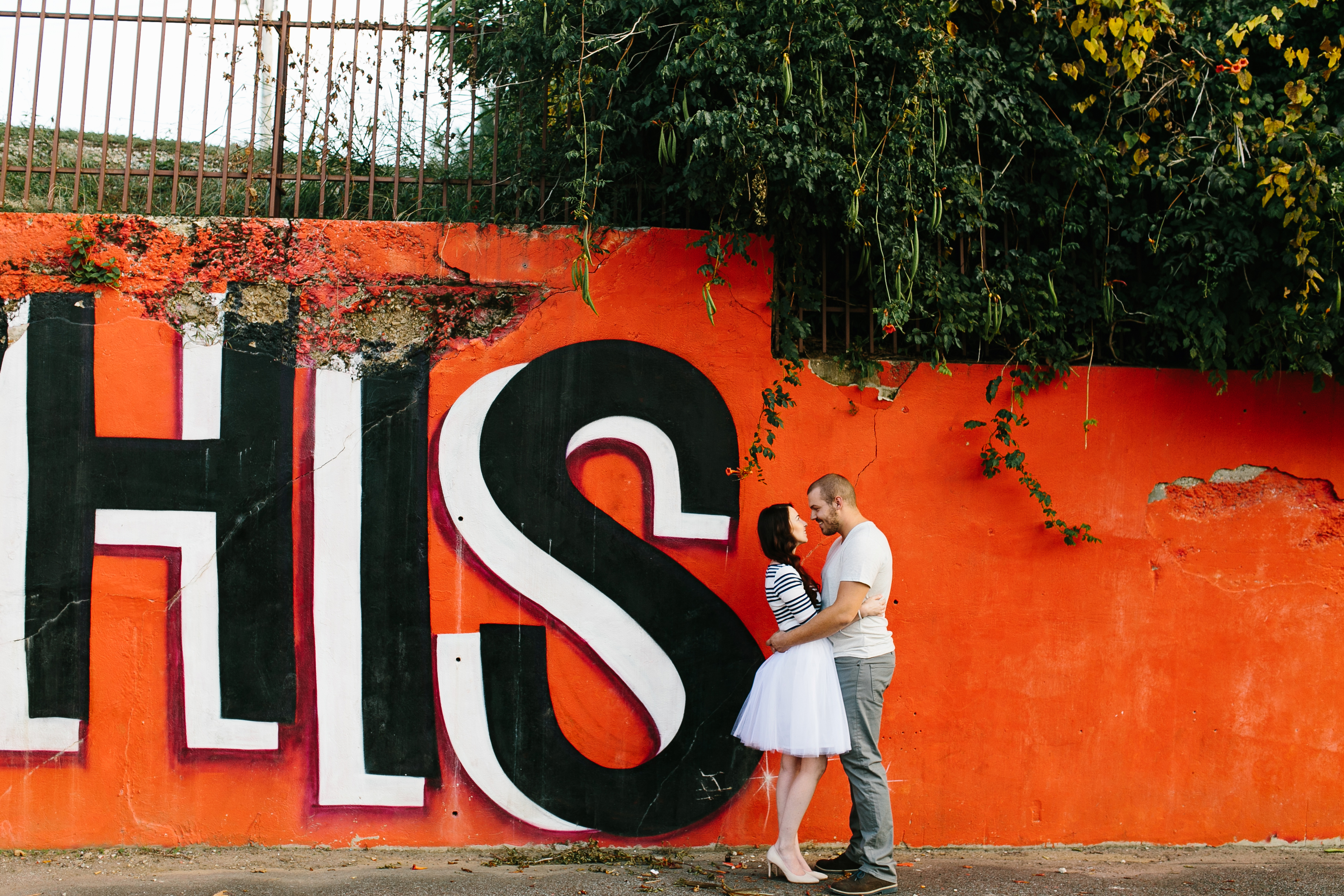 creative engagement photos. Urban engagement session, midtown engagement session. Journalistic wedding photographer. Tulle skirt