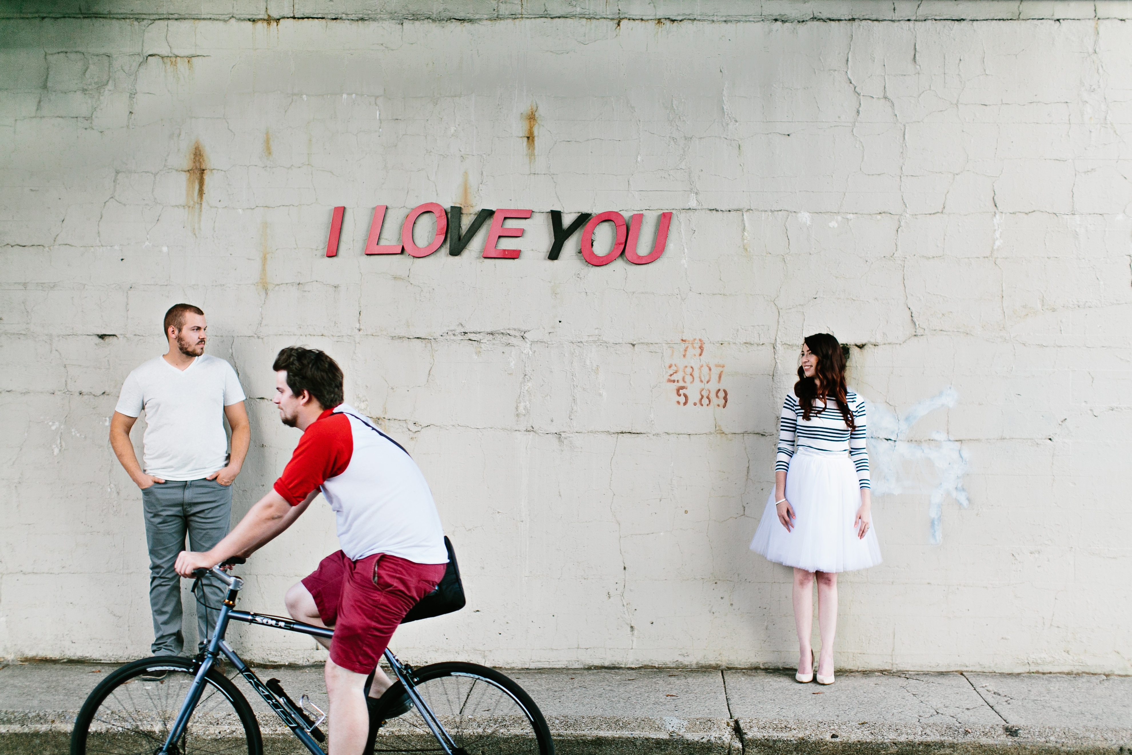 creative engagement photos. Urban engagement session, midtown engagement session. Journalistic wedding photographer. Tulle skirt