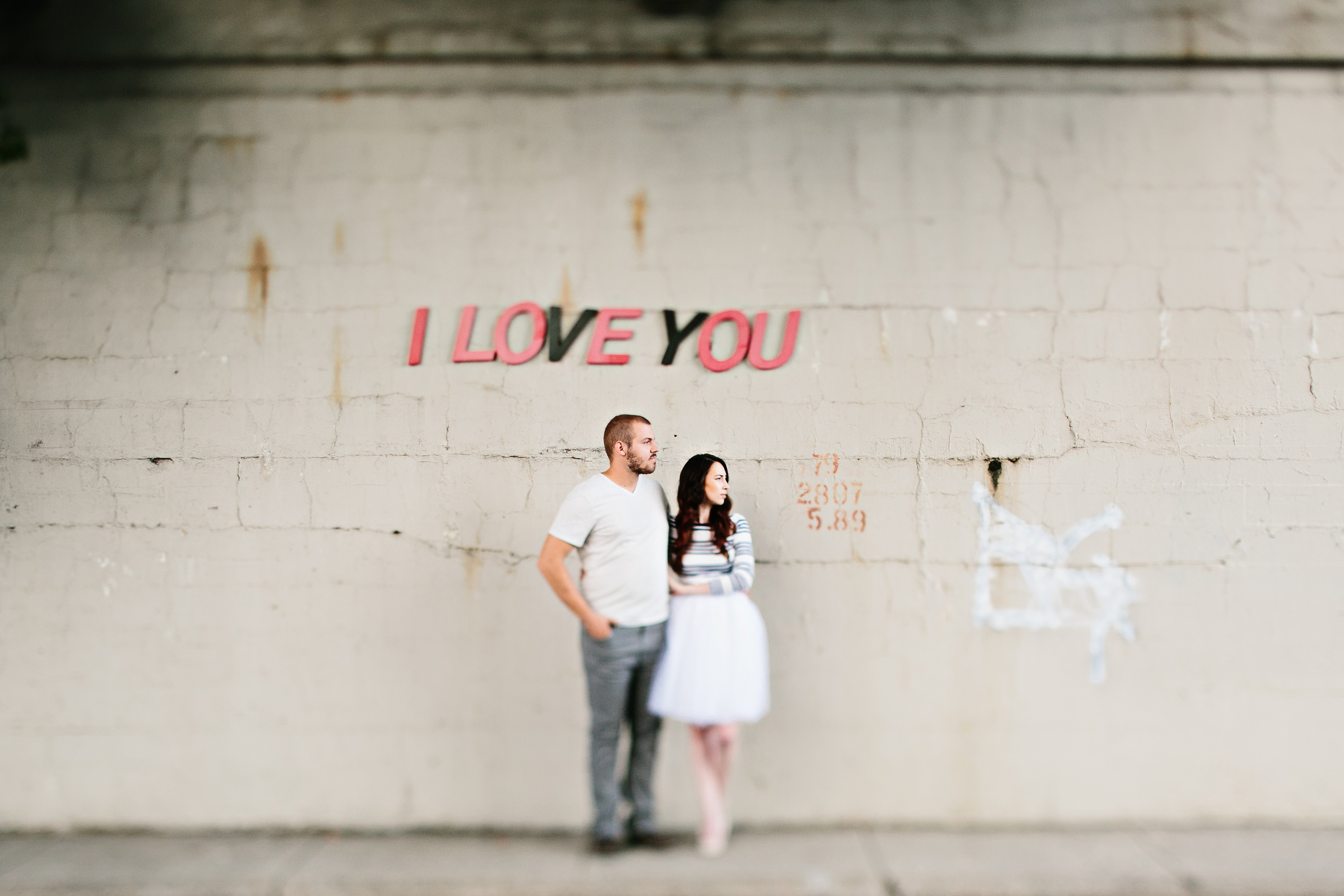 creative engagement photos. Urban engagement session, midtown engagement session. Journalistic wedding photographer. Tulle skirt