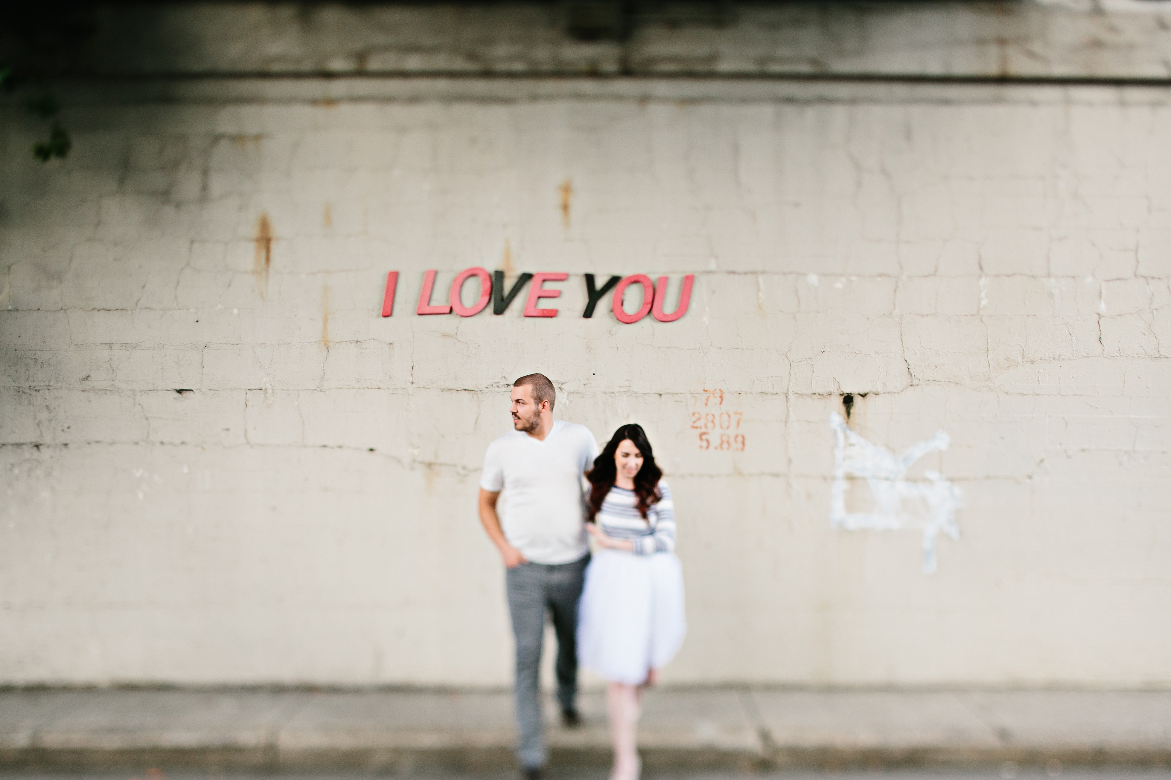 creative engagement photos. Urban engagement session, midtown engagement session. Journalistic wedding photographer. Tulle skirt