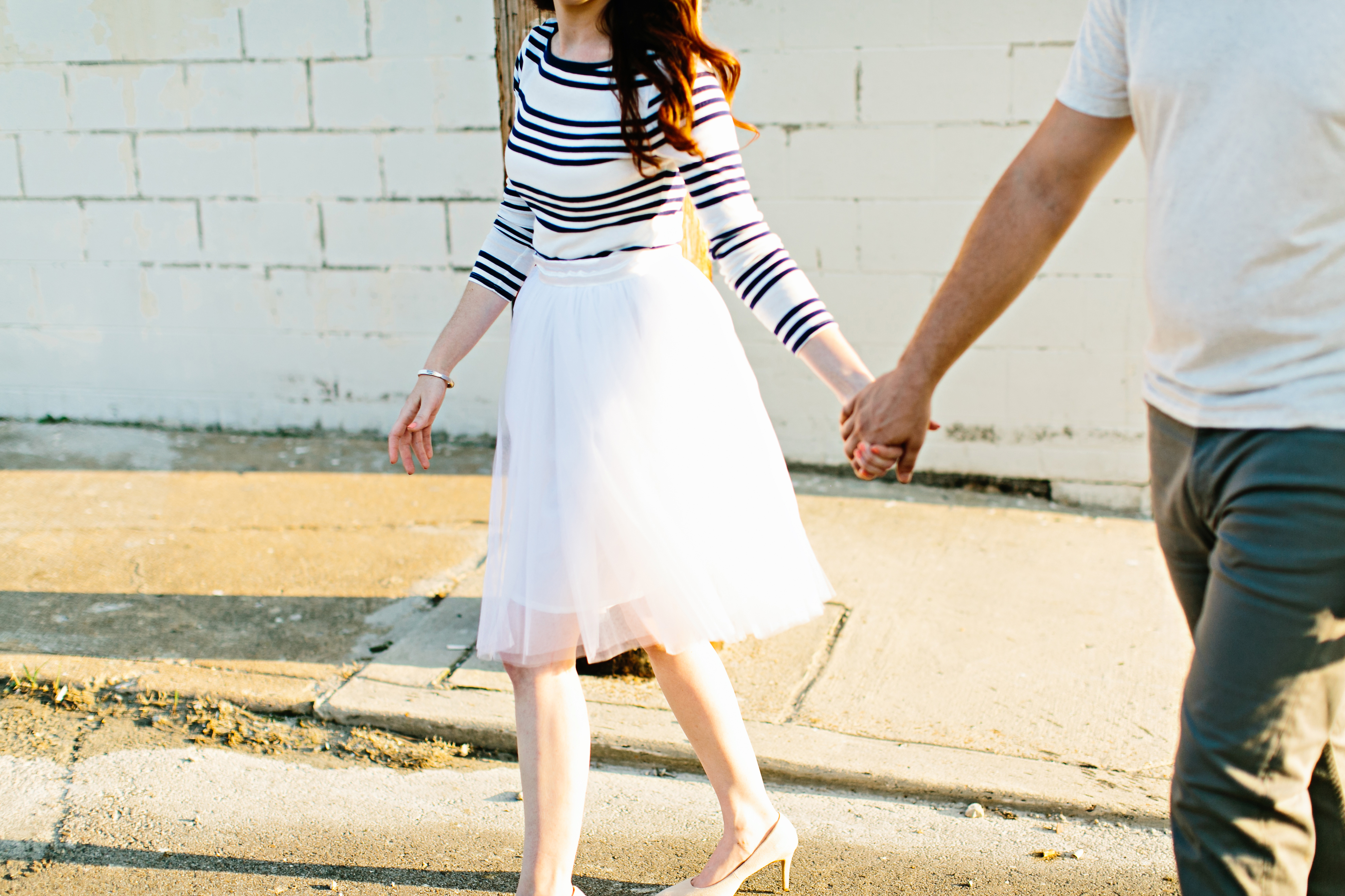 creative engagement photos. Urban engagement session, midtown engagement session. Journalistic wedding photographer. Tulle skirt