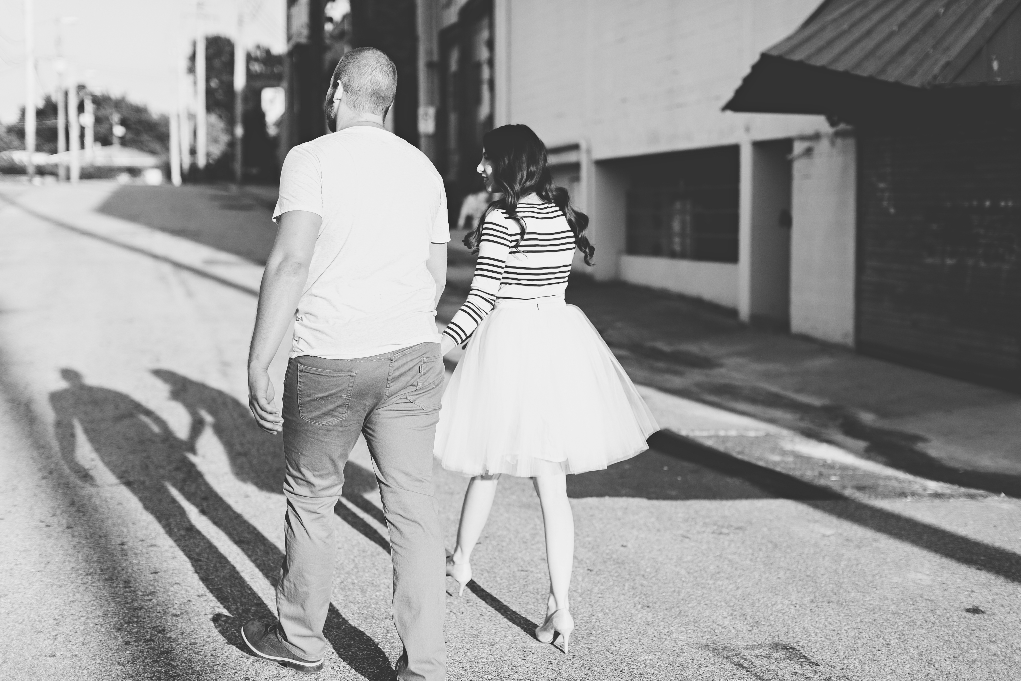 creative engagement photos. Urban engagement session, midtown engagement session. Journalistic wedding photographer. Tulle skirt