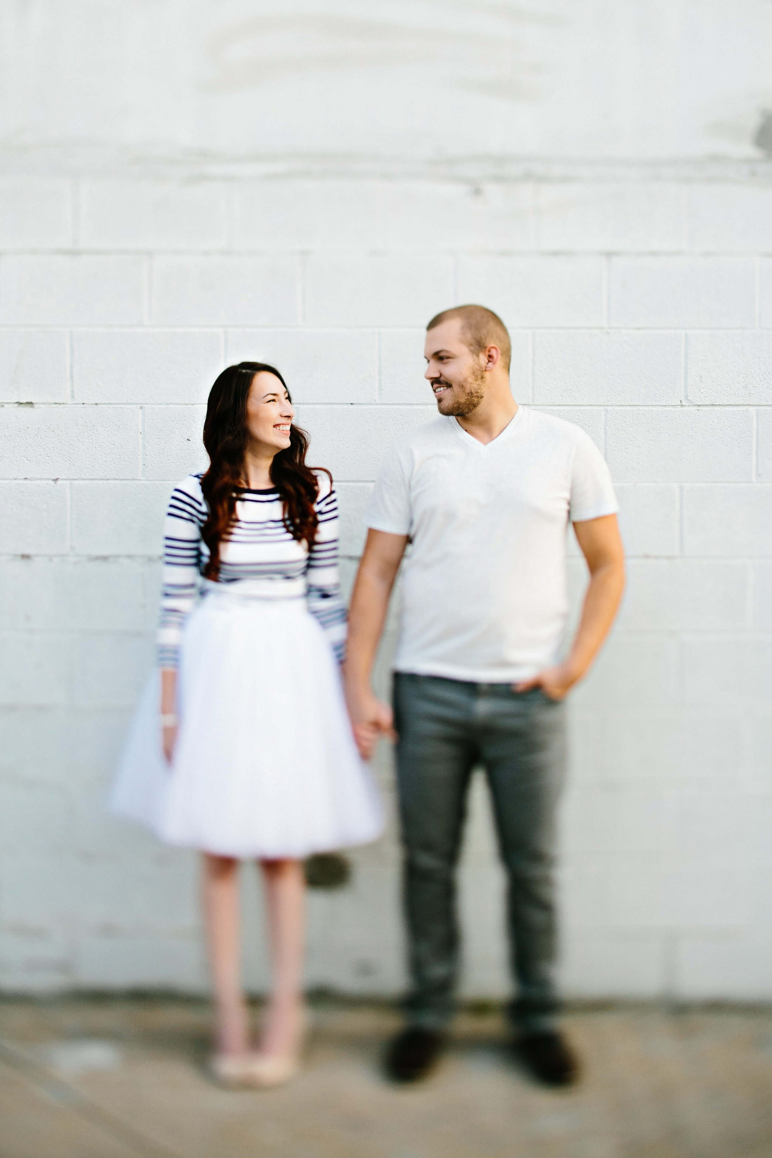 creative engagement photos. Urban engagement session, midtown engagement session. Journalistic wedding photographer. Tulle skirt