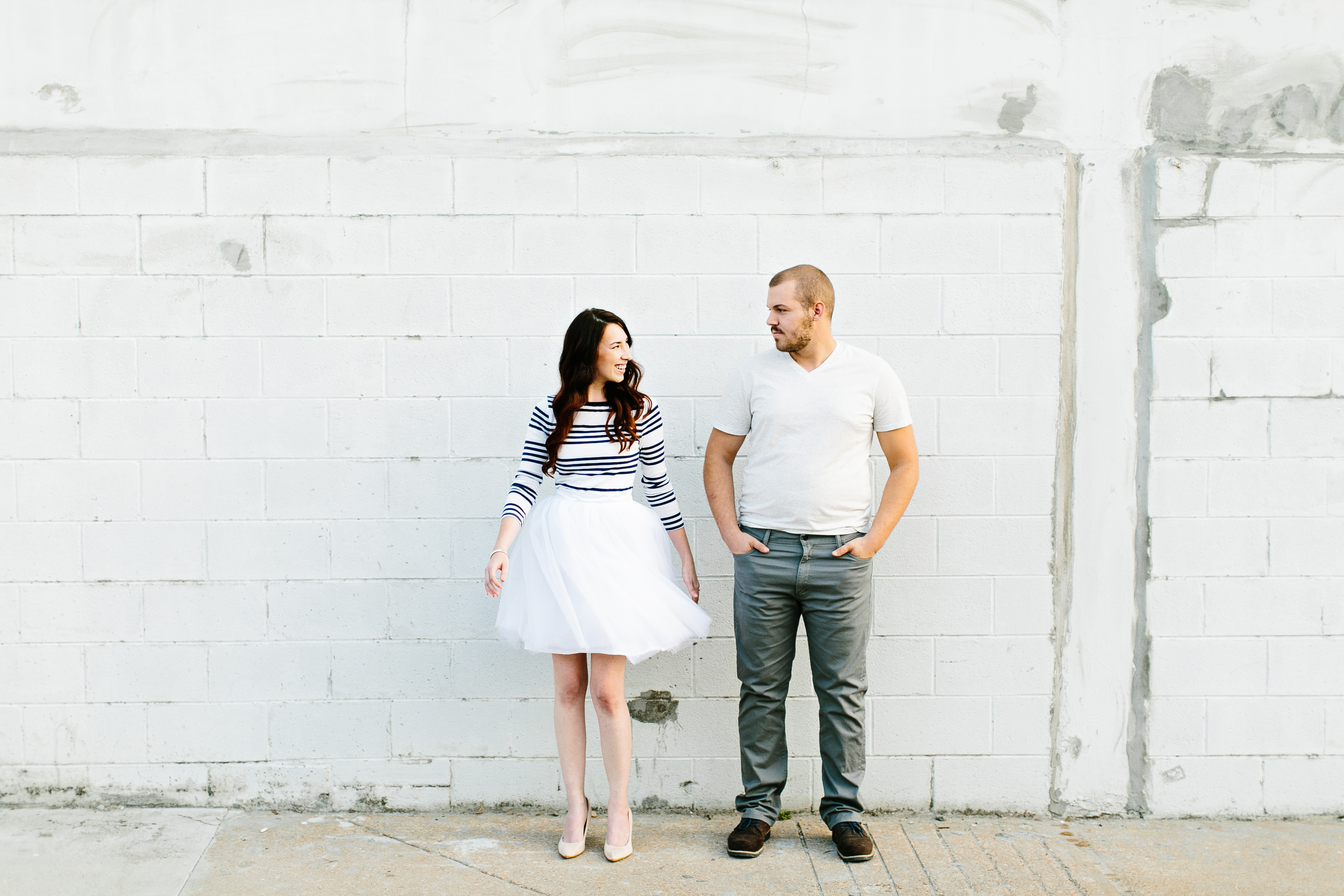 creative engagement photos. Urban engagement session, midtown engagement session. Journalistic wedding photographer. Tulle skirt