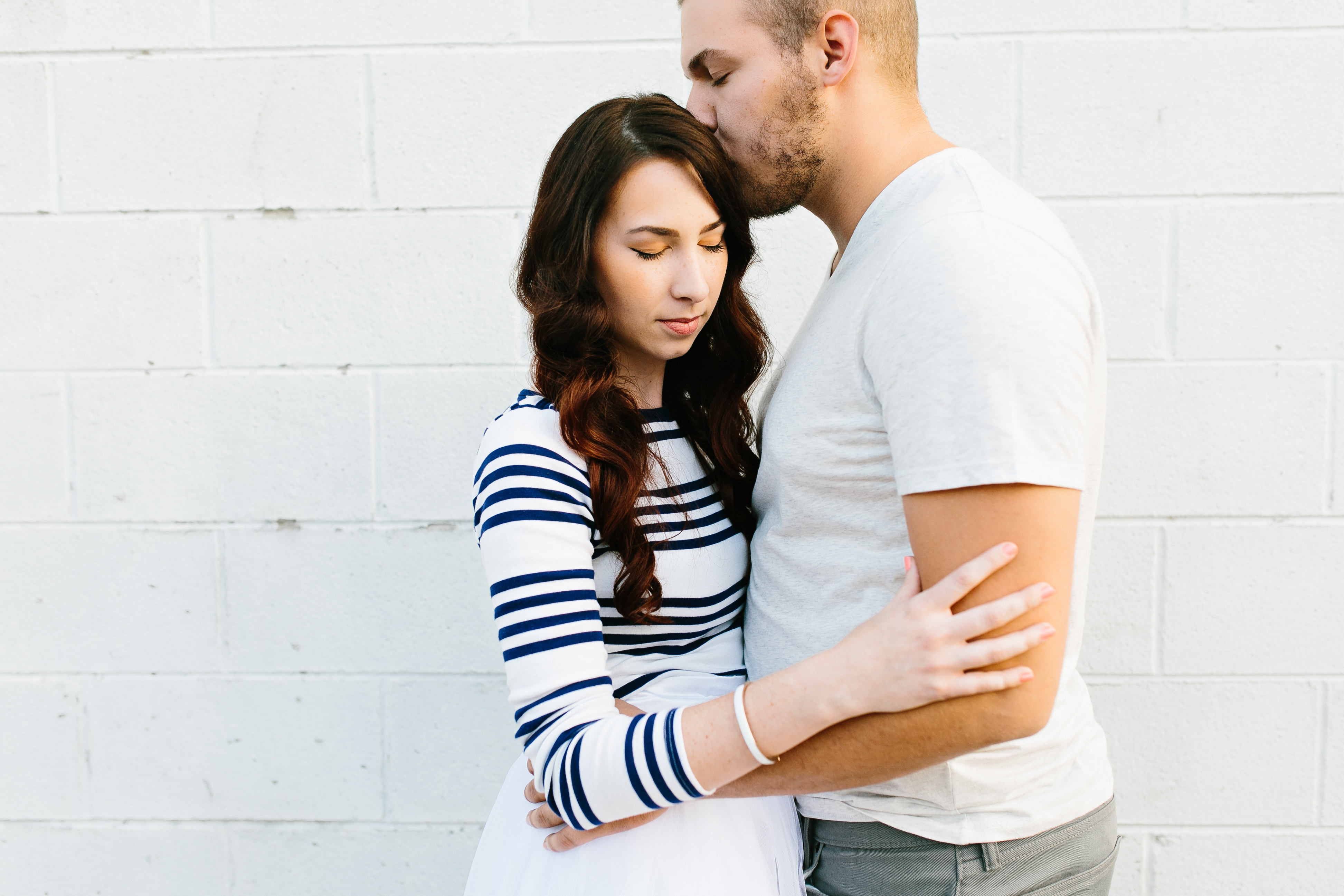 creative engagement photos. Urban engagement session, midtown engagement session. Journalistic wedding photographer. Tulle skirt