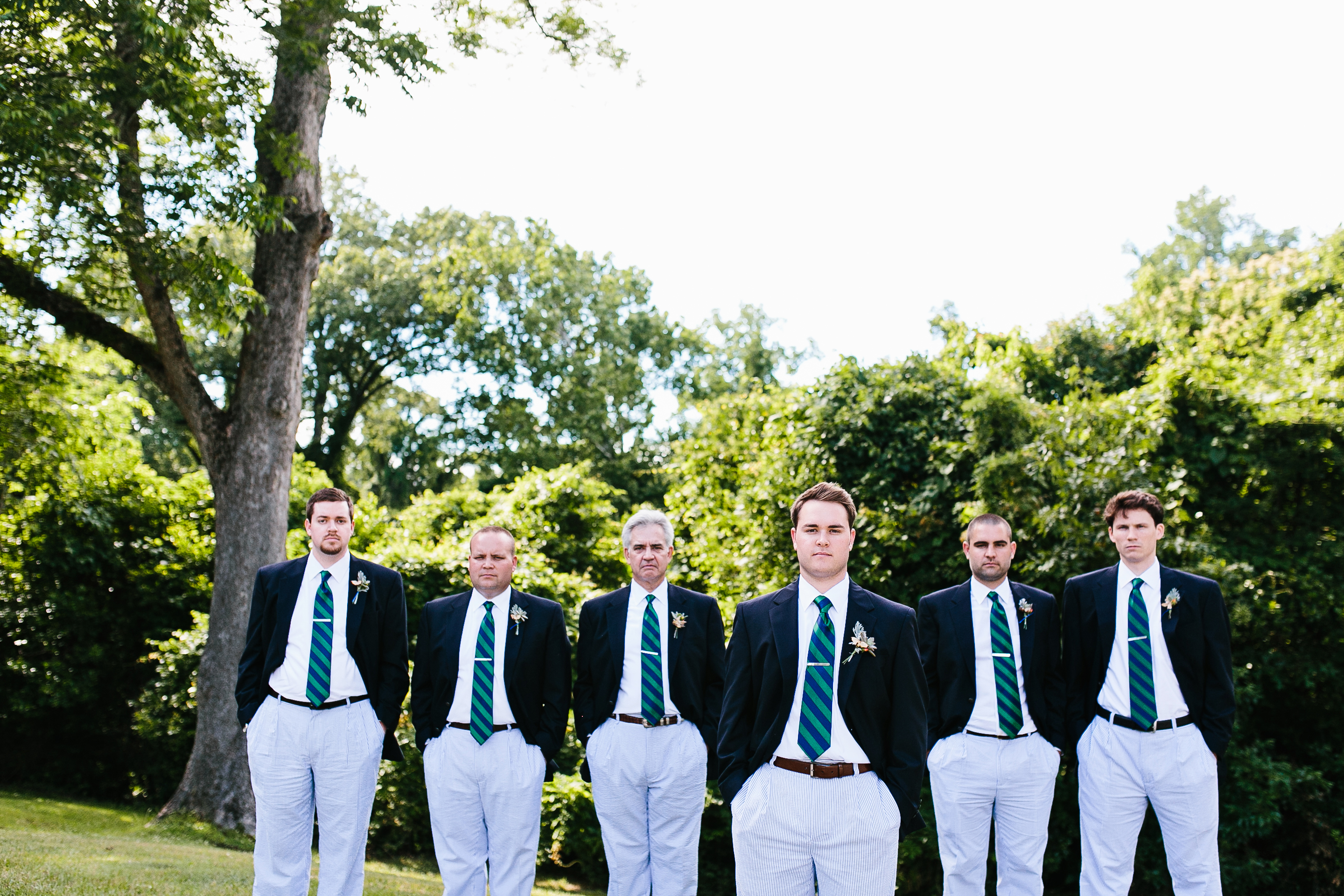 seersucker groomsmen suits, preppy wedding attire, striped tie, custom tie clip