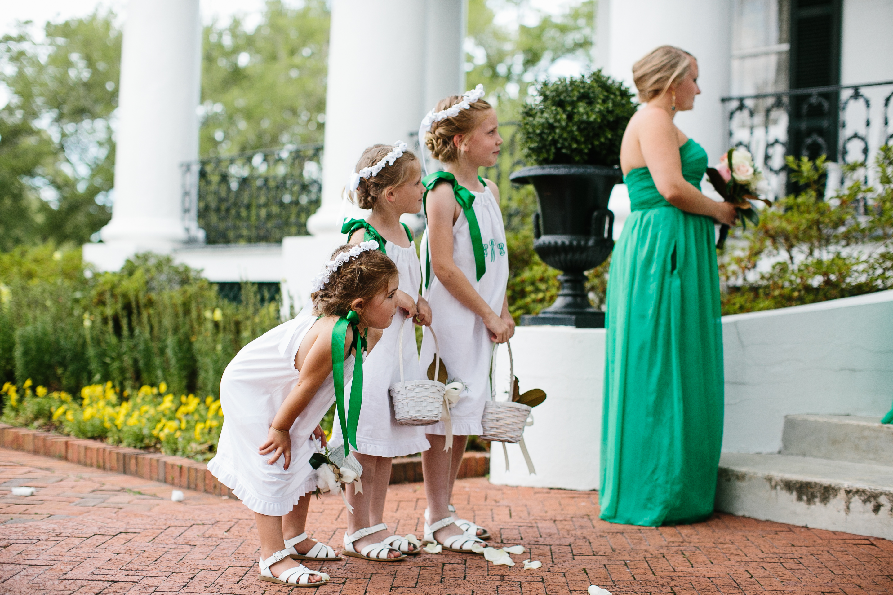 Dunleith Historic Inn Wedding. Creative wedding photographer, journalistic wedding photographer. Curious flower girls