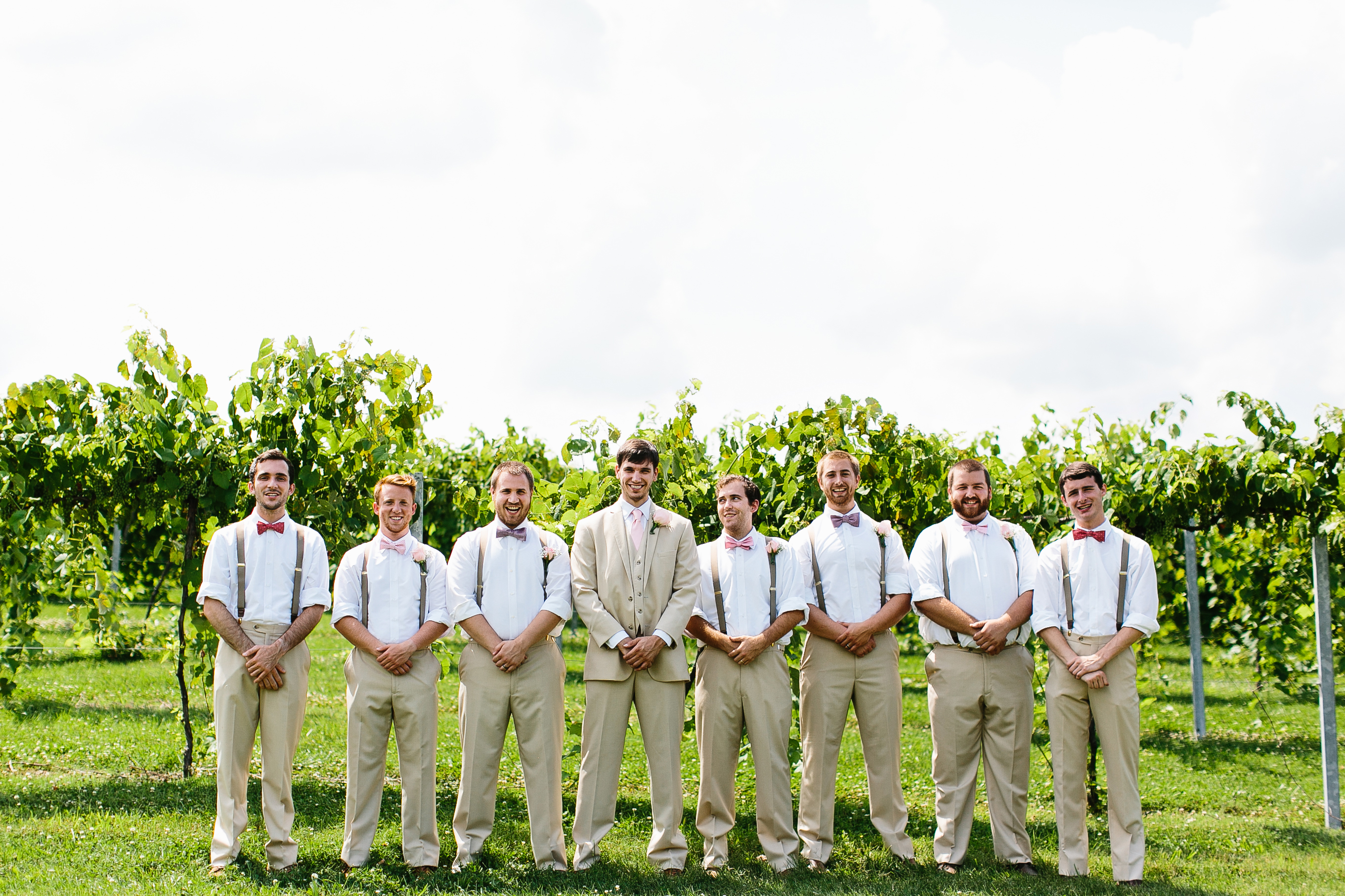 groomsmen with suspenders. causal groomsmen attire. groomsmen