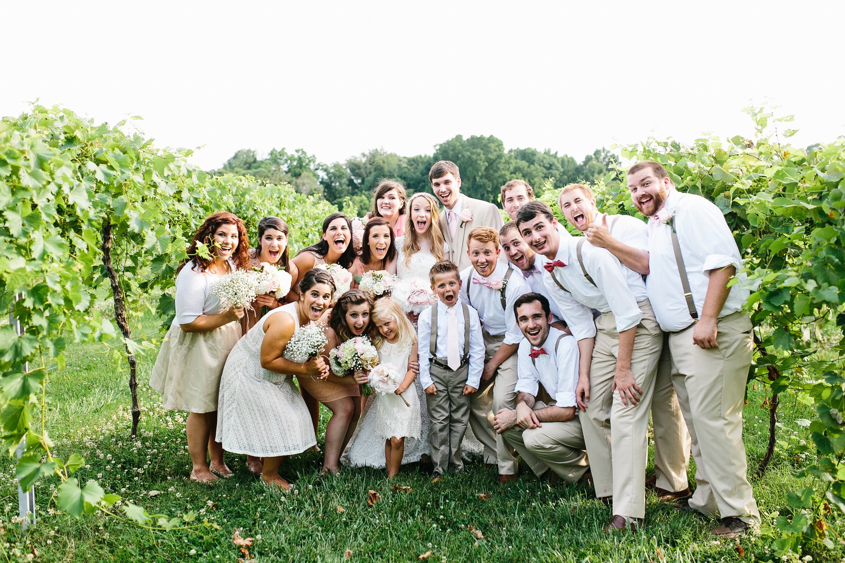 casual bridal party. large bridal party. peach and gold wedding. gold wedding. trendy wedding.