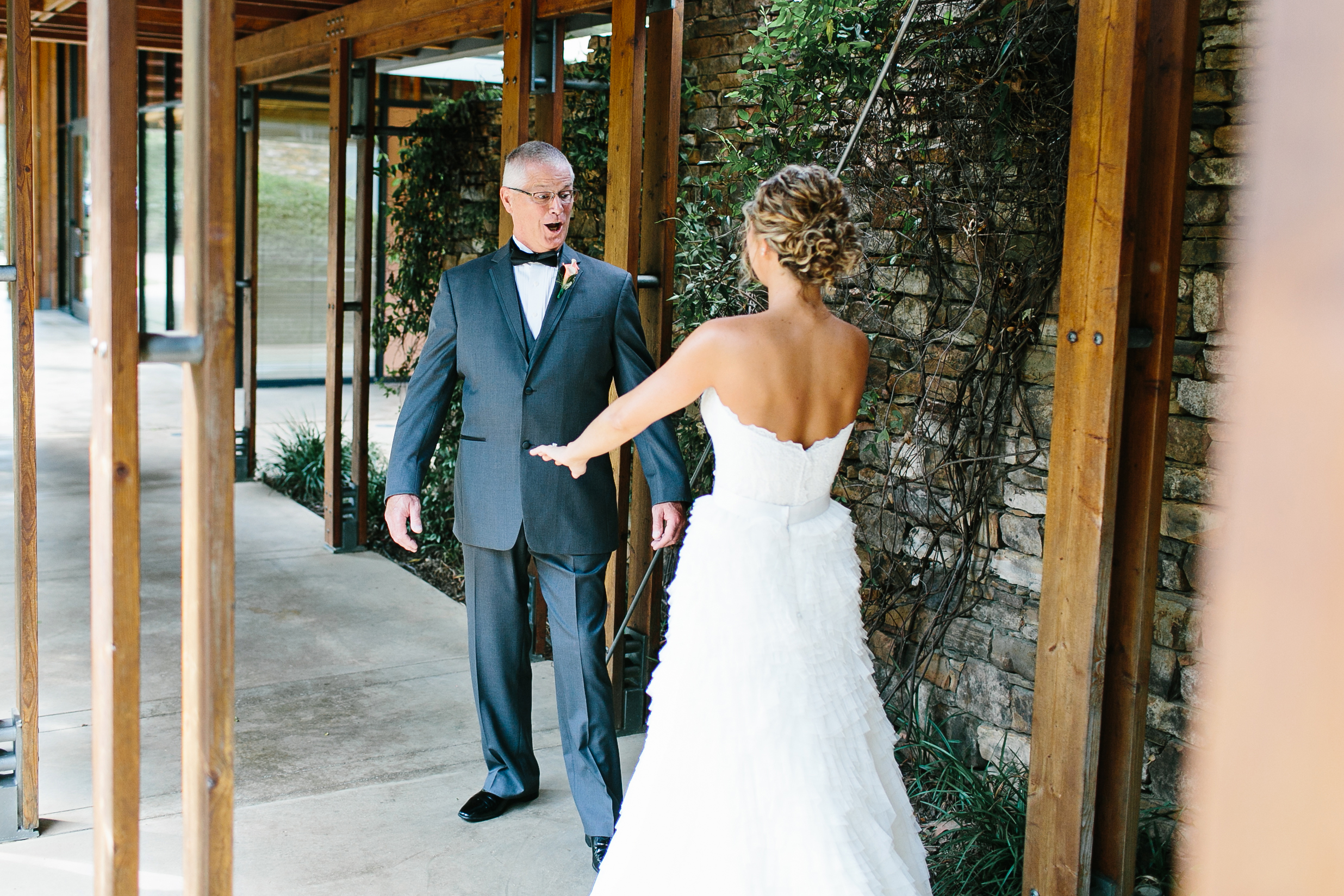 father daughter first look. emotional first look with dad