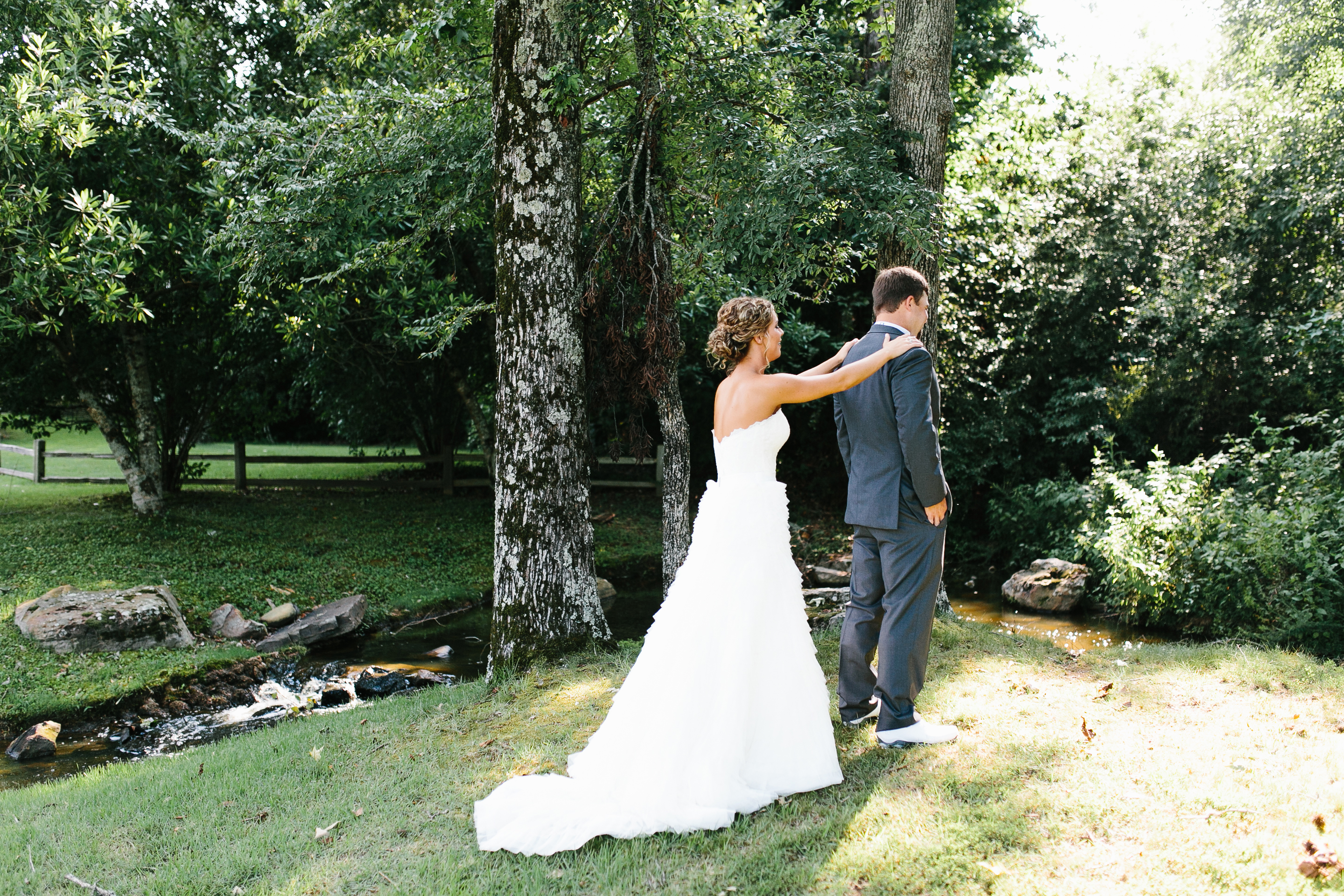 emotional wedding first look with groom. bride and groom first look