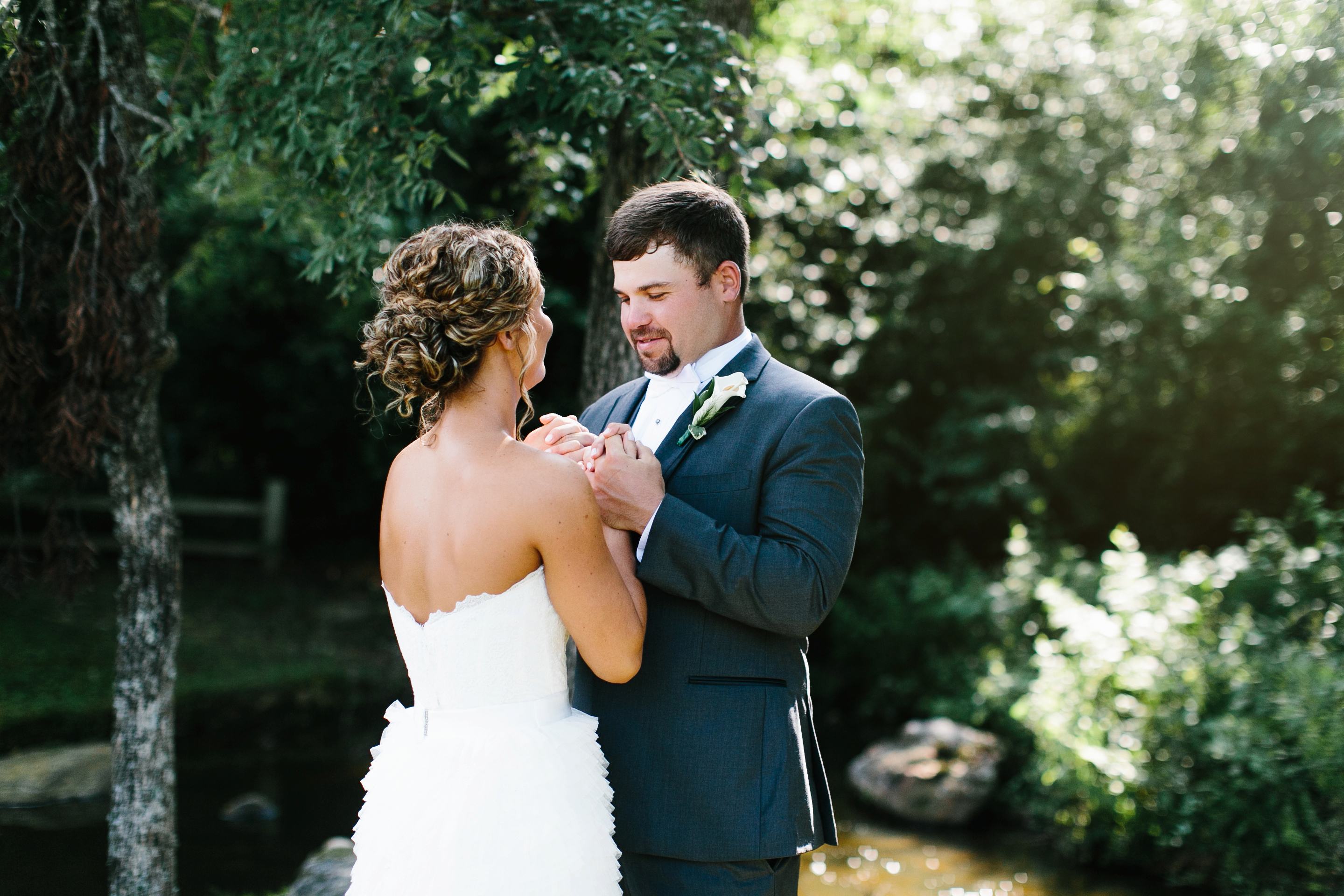 emotional wedding first look with groom. bride and groom first look