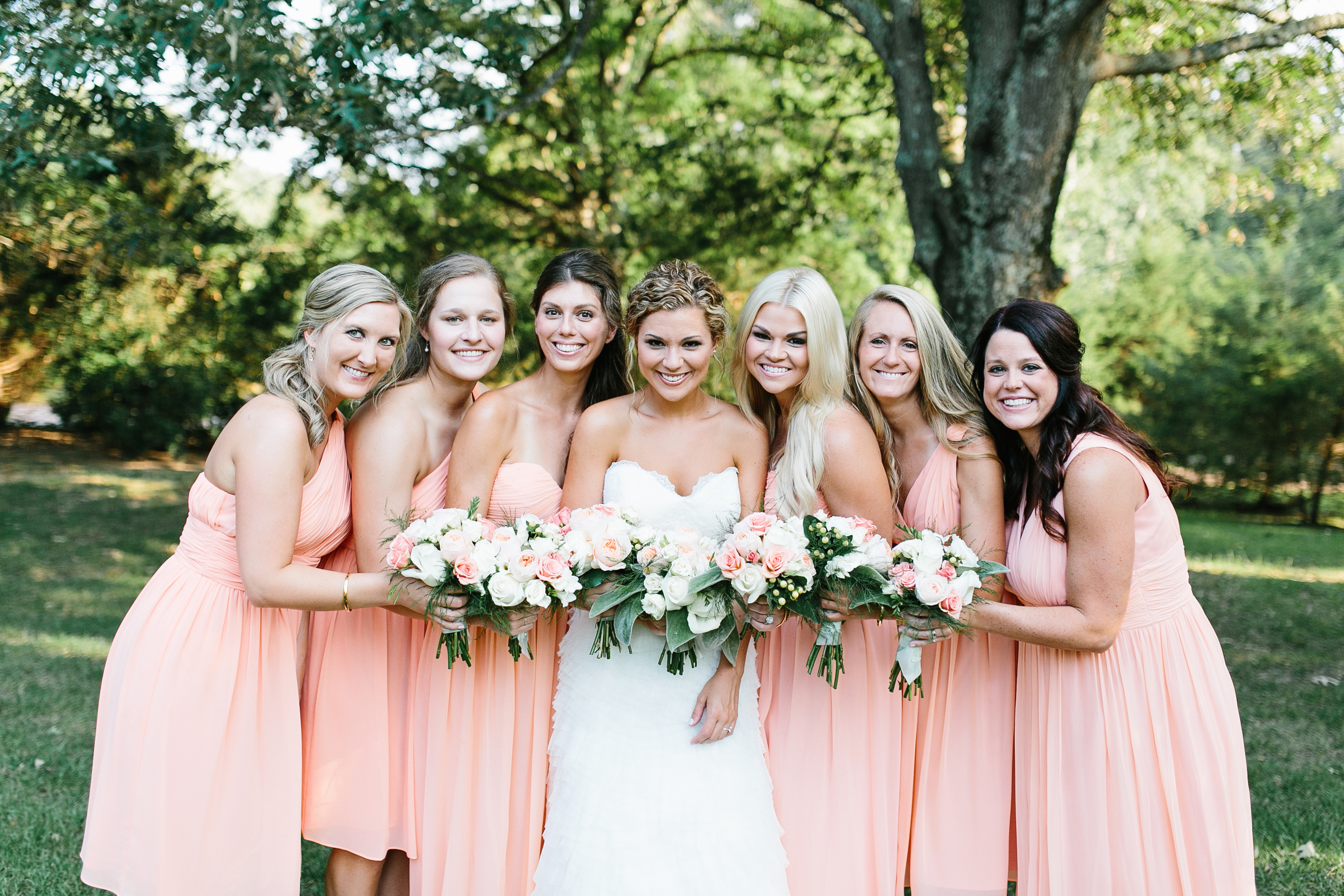 creative wedding photos. intimate wedding photography. tennessee wedding photography. peach bridal party. bridesmaids in coral dresses