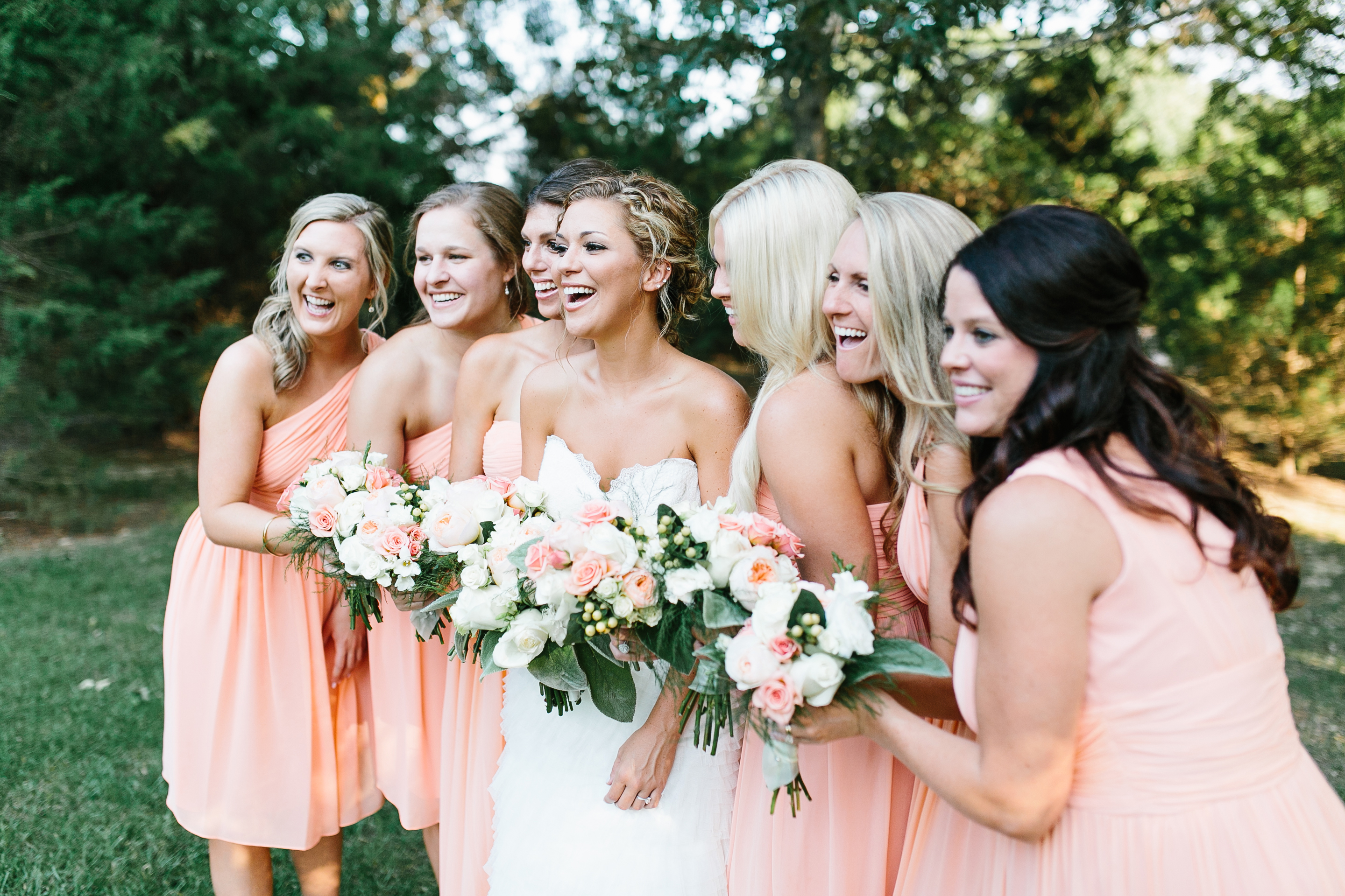 creative wedding photos. intimate wedding photography. tennessee wedding photography. peach bridal party. bridesmaids in coral dresses