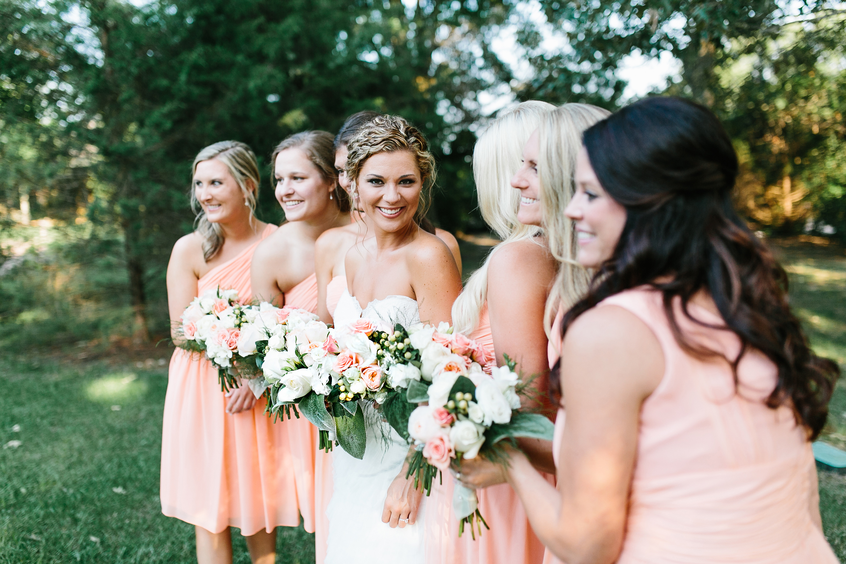 creative wedding photos. intimate wedding photography. tennessee wedding photography. peach bridal party. bridesmaids in coral dresses