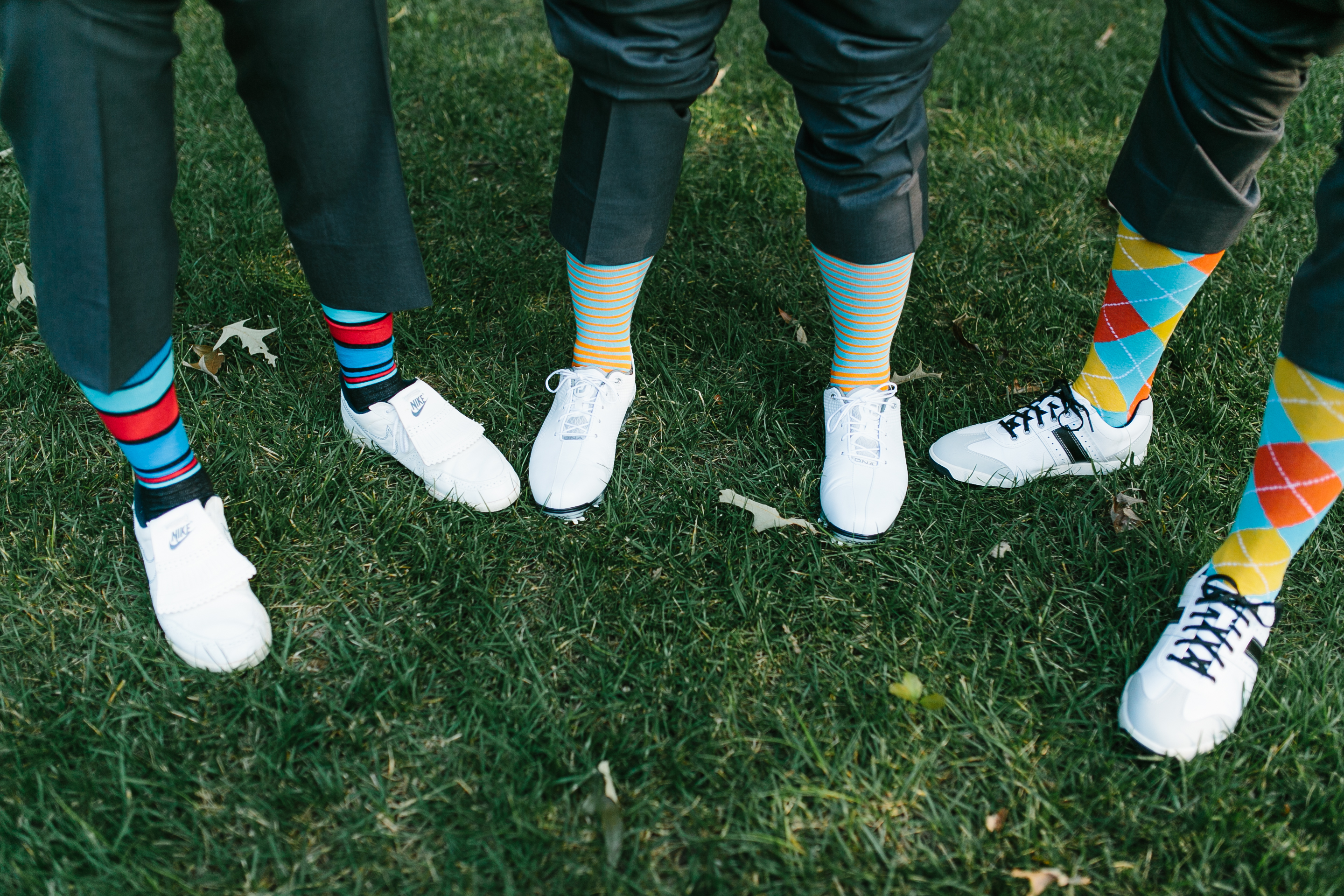 creative wedding photos. intimate wedding photography. tennessee wedding photography. peach bridal party. bridesmaids in coral dresses. groomsmen with funny socks