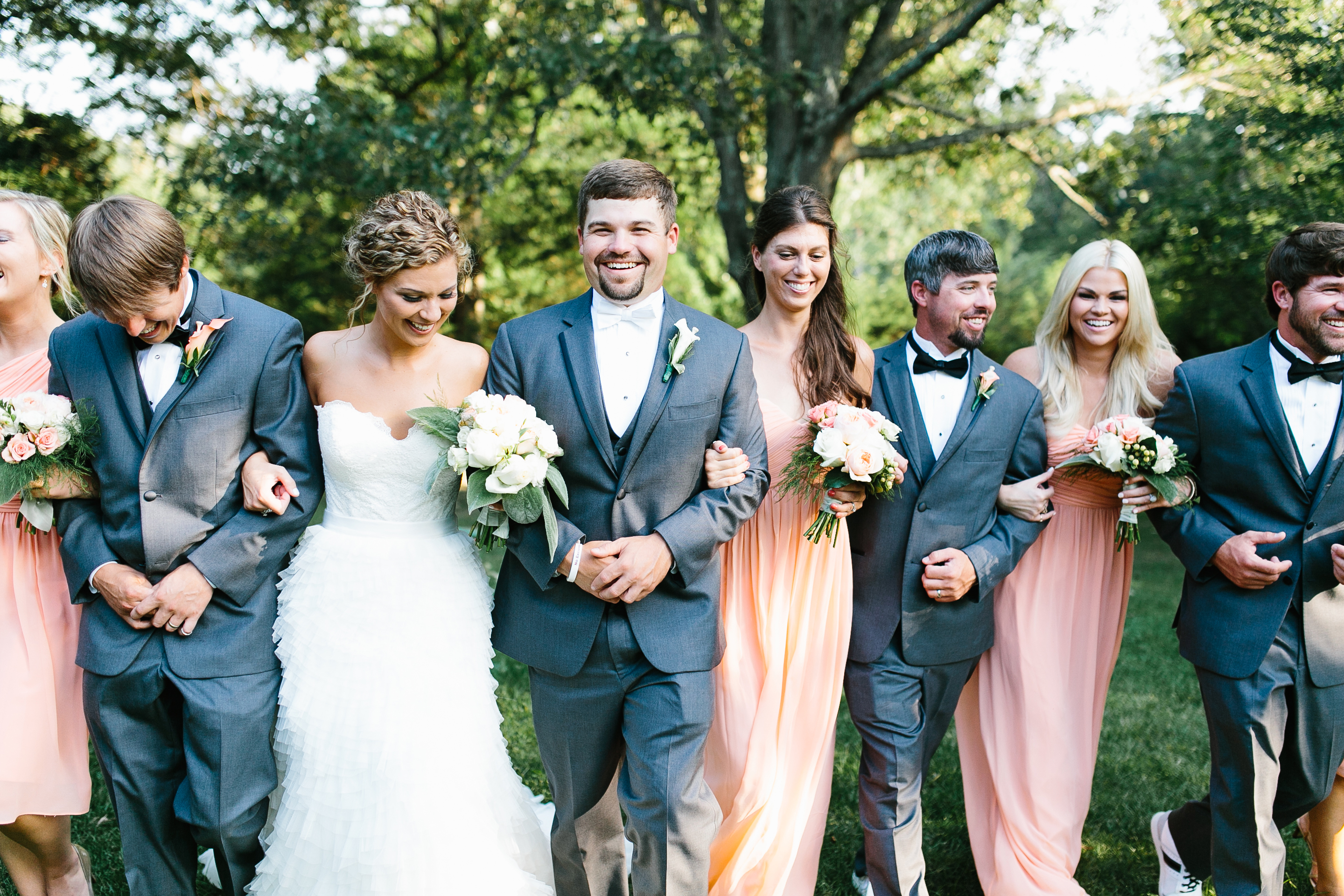 creative wedding photos. intimate wedding photography. tennessee wedding photography. peach bridal party. bridesmaids in coral dresses