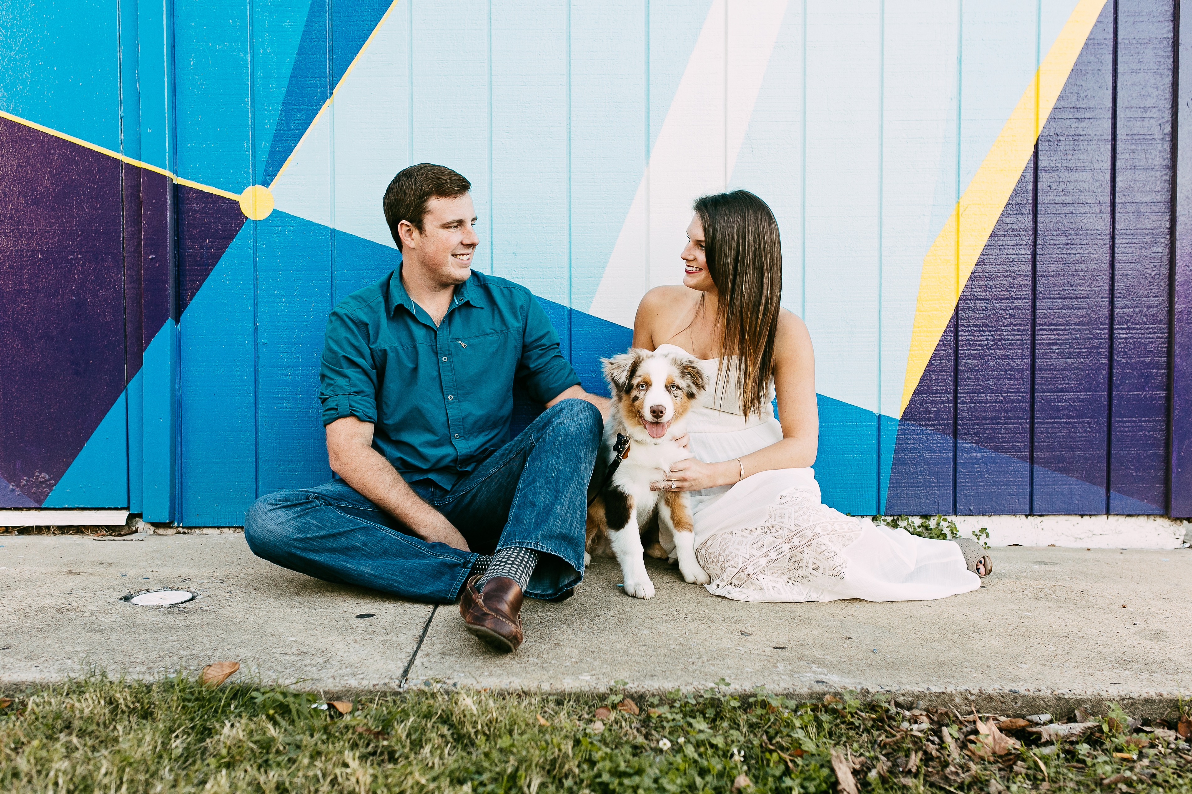 grafitti engagement. urban engagement session. art district engagement session. graffiti engagement photos. engagement photos with dog
