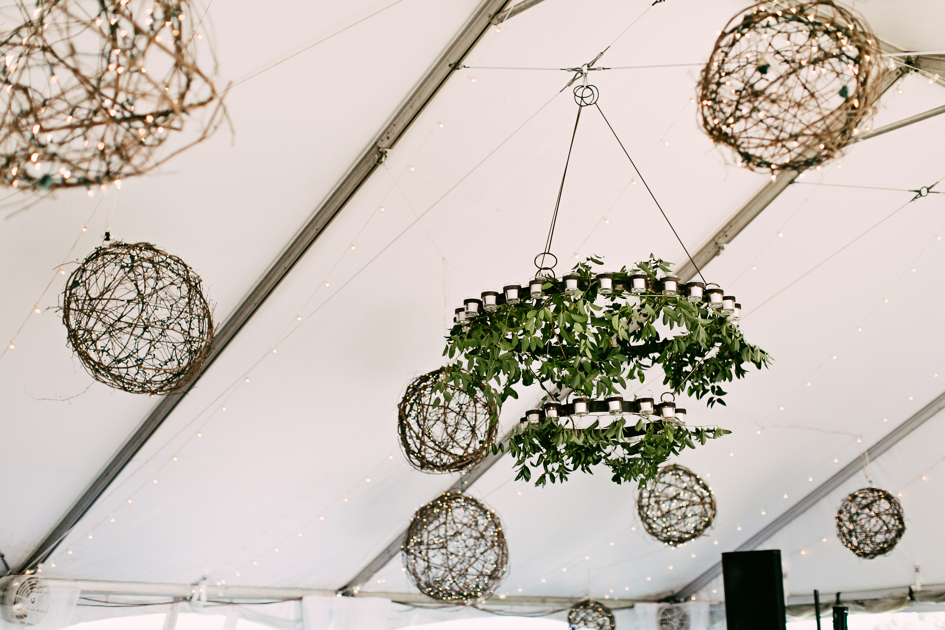 peonies-bride-bouquet-coral-and-grey-wedding-colors-wagon-wheel-chandelier
