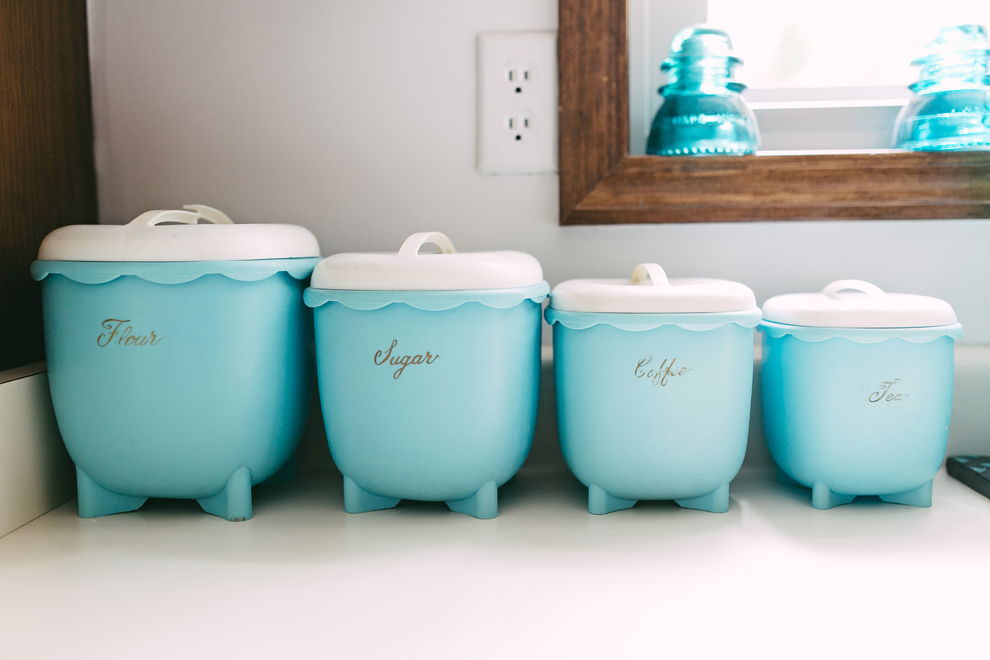 vintage-blue-counter-canisters 